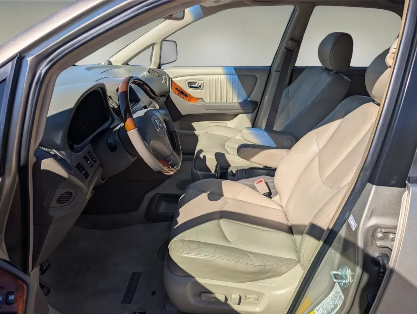 2003 Lexus RX 300 (JTJGF10U330) with an Other engine, located at 1430 Gateway Drive, Opelika, AL, 36801, (334) 239-0944, 32.637871, -85.409790 - **Explore the 2003 Lexus RX 300: Your Perfect Companion for Family Adventures and Daily Commutes!**<br /> <br /> Are you seeking a reliable vehicle that caters to your family's needs while ensuring comfort and style? Look no further! This 2003 Lexus RX 300, available at **Gils Auto** in **Phenix Cit - Photo#9