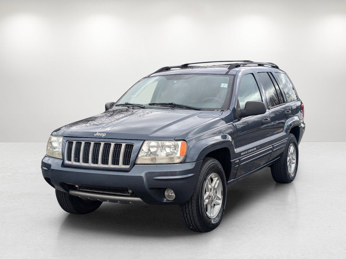 2004 Steel Blue Pearl /Dark Slate Gray Jeep Grand Cherokee Laredo (1J4GX48S34C) with an Gas I6 4.0L/242 engine, 4-Speed Automatic w/OD transmission, located at 1430 Gateway Drive, Opelika, AL, 36801, (334) 239-0944, 32.637871, -85.409790 - 2004 Jeep Grand Cherokee Laredo - Photo#0