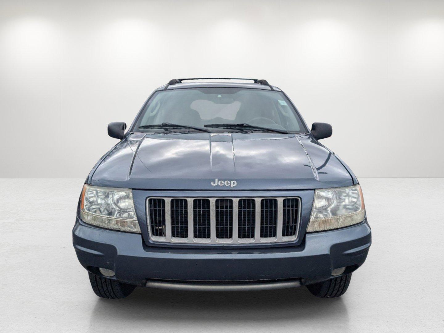 2004 Steel Blue Pearl /Dark Slate Gray Jeep Grand Cherokee Laredo (1J4GX48S34C) with an Gas I6 4.0L/242 engine, 4-Speed Automatic w/OD transmission, located at 1430 Gateway Drive, Opelika, AL, 36801, (334) 239-0944, 32.637871, -85.409790 - 2004 Jeep Grand Cherokee Laredo - Photo#1