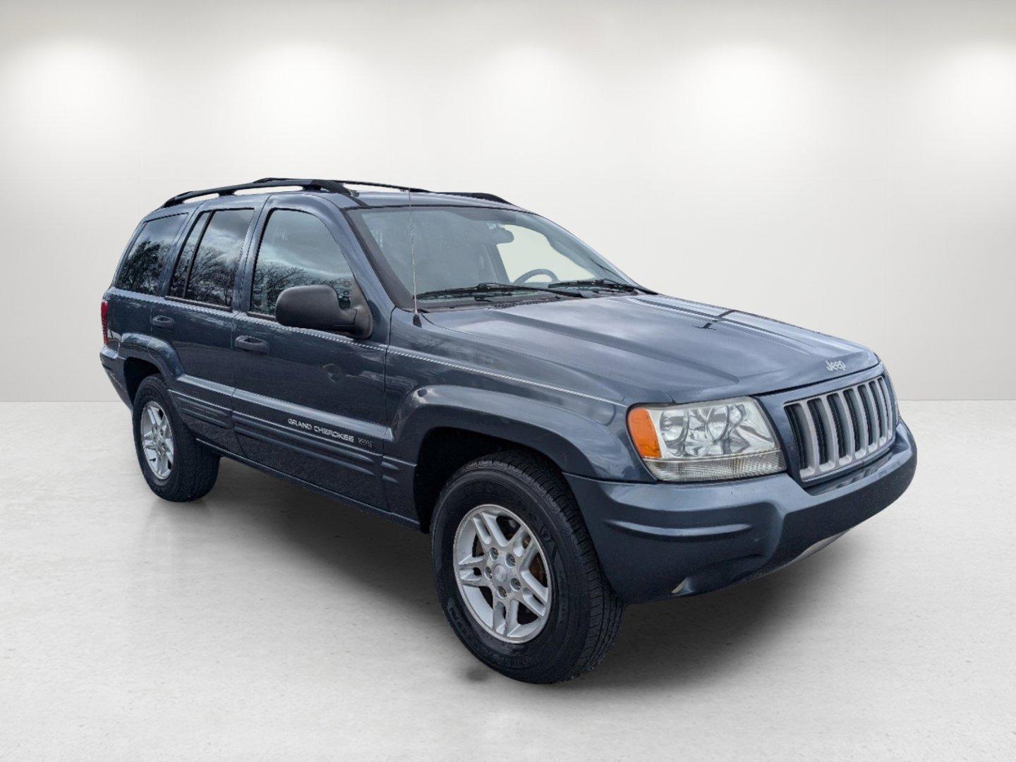 2004 Steel Blue Pearl /Dark Slate Gray Jeep Grand Cherokee Laredo (1J4GX48S34C) with an Gas I6 4.0L/242 engine, 4-Speed Automatic w/OD transmission, located at 1430 Gateway Drive, Opelika, AL, 36801, (334) 239-0944, 32.637871, -85.409790 - 2004 Jeep Grand Cherokee Laredo - Photo#2