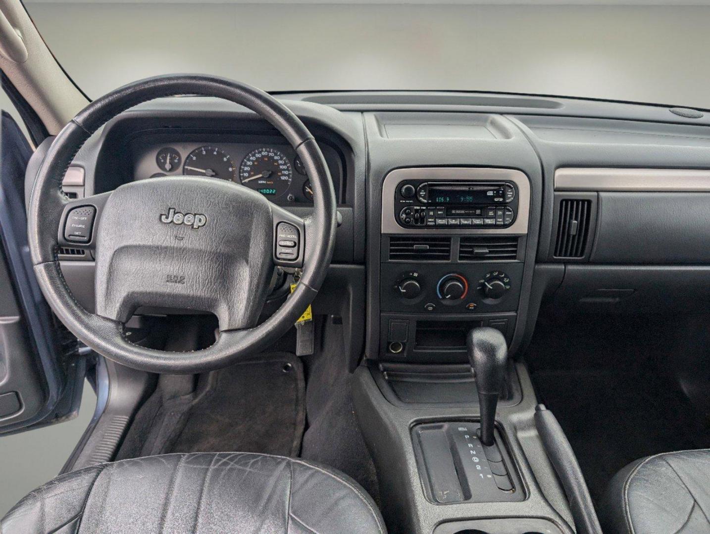 2004 Steel Blue Pearl /Dark Slate Gray Jeep Grand Cherokee Laredo (1J4GX48S34C) with an Gas I6 4.0L/242 engine, 4-Speed Automatic w/OD transmission, located at 1430 Gateway Drive, Opelika, AL, 36801, (334) 239-0944, 32.637871, -85.409790 - 2004 Jeep Grand Cherokee Laredo - Photo#11