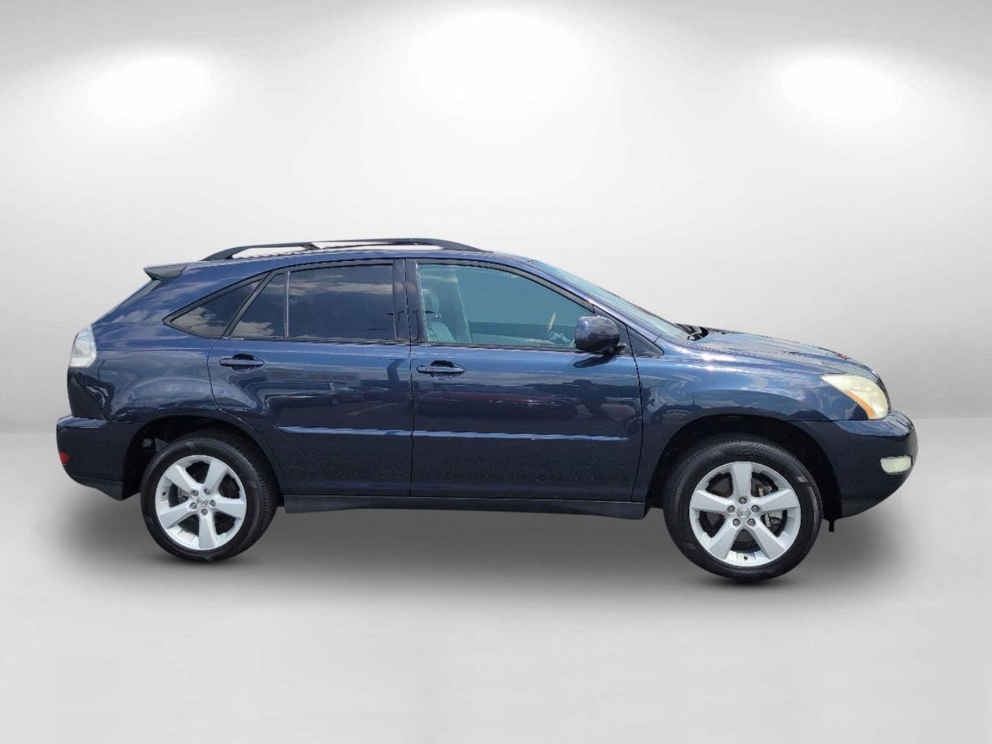 2006 Blue Lexus RX 330 (2T2GA31U66C) with an Gas V6 3.3L/202 engine, 5-Speed Automatic w/OD transmission, located at 1430 Gateway Drive, Opelika, AL, 36801, (334) 239-0944, 32.637871, -85.409790 - 2006 Lexus RX 330 - Photo#3