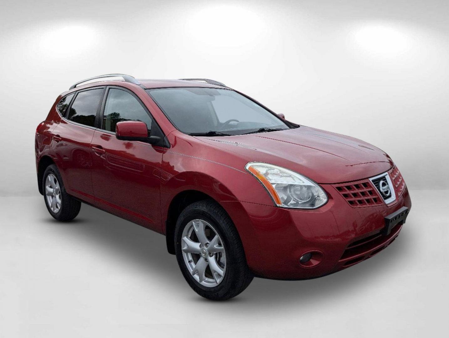 2009 /Black/Red Nissan Rogue SL (JN8AS58T79W) with an Gas I4 2.5L/ engine, 1-Speed Continuously Variable Automatic (CVT) transmission, located at 1430 Gateway Drive, Opelika, AL, 36801, (334) 239-0944, 32.637871, -85.409790 - 2009 Nissan Rogue SL - Photo#2