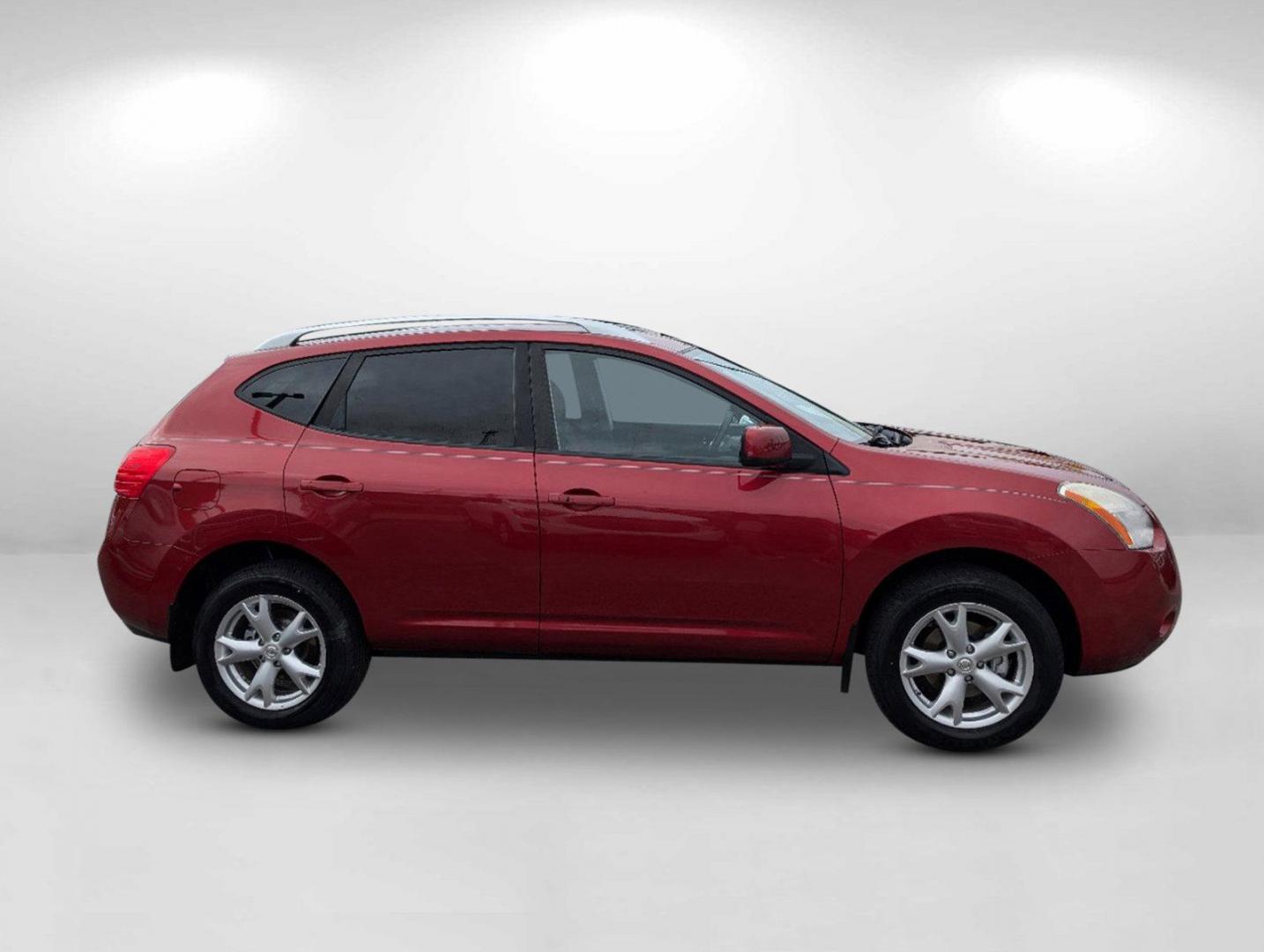 2009 /Black/Red Nissan Rogue SL (JN8AS58T79W) with an Gas I4 2.5L/ engine, 1-Speed Continuously Variable Automatic (CVT) transmission, located at 1430 Gateway Drive, Opelika, AL, 36801, (334) 239-0944, 32.637871, -85.409790 - 2009 Nissan Rogue SL - Photo#3