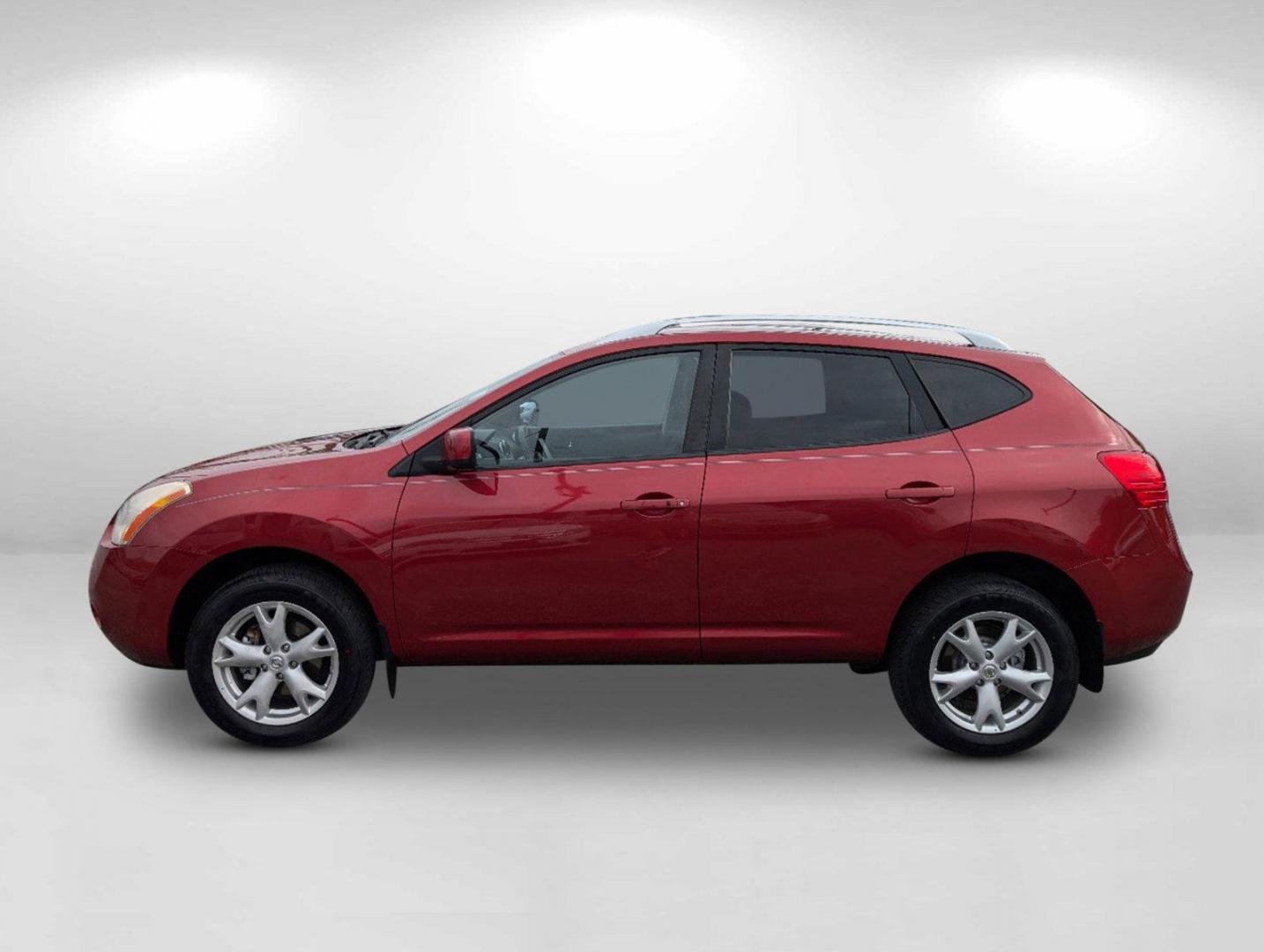 2009 /Black/Red Nissan Rogue SL (JN8AS58T79W) with an Gas I4 2.5L/ engine, 1-Speed Continuously Variable Automatic (CVT) transmission, located at 1430 Gateway Drive, Opelika, AL, 36801, (334) 239-0944, 32.637871, -85.409790 - 2009 Nissan Rogue SL - Photo#7