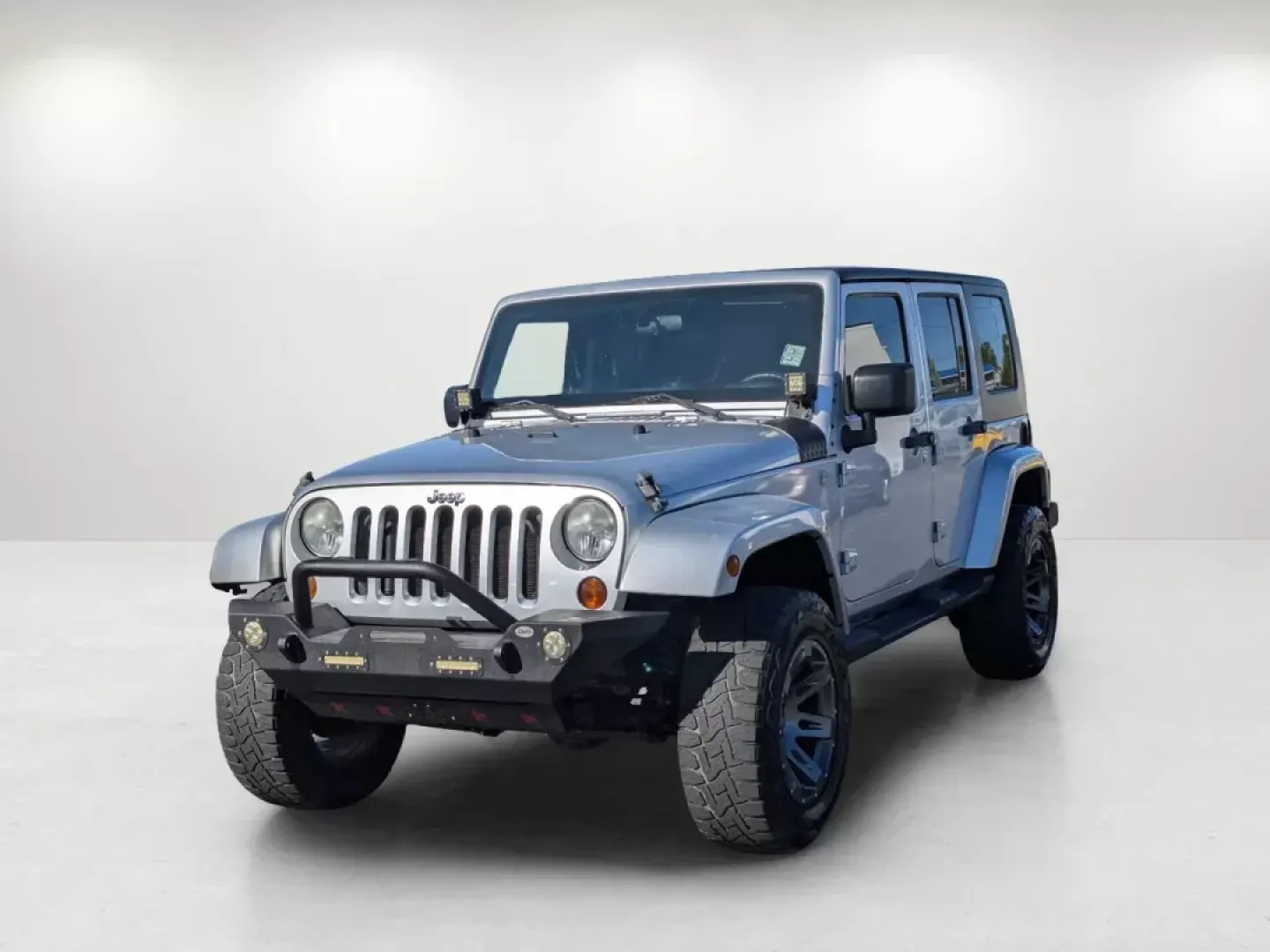 2010 /Dark Slate Gray/Medium Slate Gray Jeep Wrangler Unlimited Sahara (1J4BA5H13AL) with an Gas V6 3.8L/231 engine, 4-Speed Automatic transmission, located at 3959 U.S. 80 W, Phenix City, AL, 36870, (334) 297-4885, 32.469296, -85.135185 - 2010 Jeep Wrangler Unlimited Sahara - Photo#0