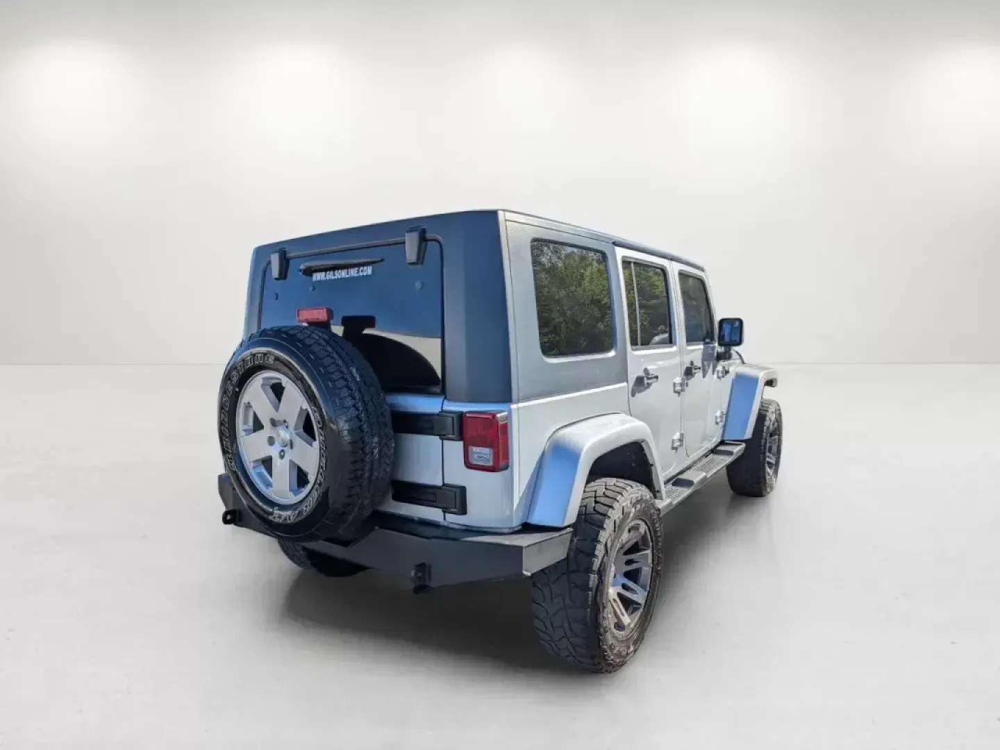 2010 /Dark Slate Gray/Medium Slate Gray Jeep Wrangler Unlimited Sahara (1J4BA5H13AL) with an Gas V6 3.8L/231 engine, 4-Speed Automatic transmission, located at 3959 U.S. 80 W, Phenix City, AL, 36870, (334) 297-4885, 32.469296, -85.135185 - 2010 Jeep Wrangler Unlimited Sahara - Photo#4