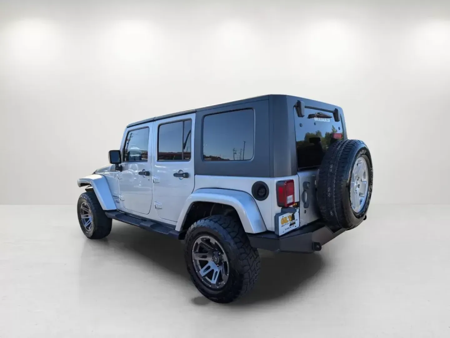 2010 /Dark Slate Gray/Medium Slate Gray Jeep Wrangler Unlimited Sahara (1J4BA5H13AL) with an Gas V6 3.8L/231 engine, 4-Speed Automatic transmission, located at 3959 U.S. 80 W, Phenix City, AL, 36870, (334) 297-4885, 32.469296, -85.135185 - 2010 Jeep Wrangler Unlimited Sahara - Photo#6