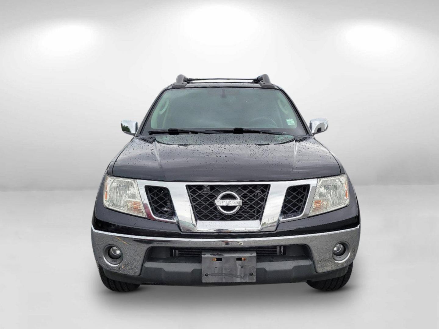 2010 Super Black /Graphite Nissan Frontier LE (1N6AD0ER7AC) with an Gas V6 4.0L/ engine, 5-Speed Automatic w/OD transmission, located at 1430 Gateway Drive, Opelika, AL, 36801, (334) 239-0944, 32.637871, -85.409790 - 2010 Nissan Frontier LE - Photo#1