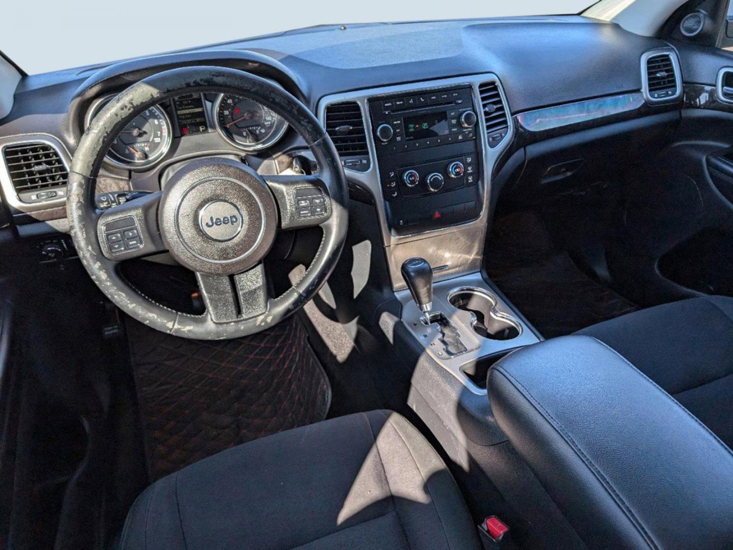 2011 /Black Interior Jeep Grand Cherokee Laredo (1J4RS4GGXBC) with an Gas/Ethanol V6 3.6L/220 engine, 5-Speed Automatic transmission, located at 521 Old Farm Lane Rd, Prattville, AL, 36066, (334) 325-1505, 32.482460, -86.416367 - 2011 Jeep Grand Cherokee Laredo - Photo#8