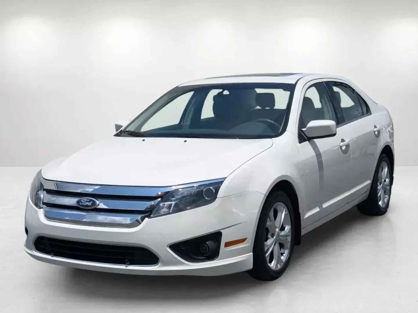 2012 Ford Fusion SE (3FAHP0HAXCR) with an Gas I4 2.5L/152 engine, 6-Speed Automatic transmission, located at 3959 U.S. 80 W, Phenix City, AL, 36870, (334) 297-4885, 32.469296, -85.135185 - **Discover Your Next Adventure with the 2012 Ford Fusion SE at Gils Auto in Phenix City, AL!**<br /> <br /> Are you looking for a reliable and stylish sedan that perfectly balances comfort and performance? The 2012 Ford Fusion SE is your perfect companion for everyday commutes or weekend getaways. W - Photo#1