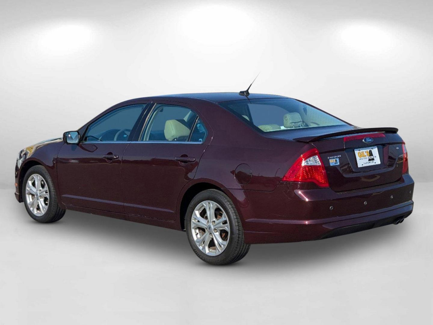 2012 Maroon Ford Fusion SE (3FAHP0HA0CR) with an Gas I4 2.5L/152 engine, 6-Speed Automatic transmission, located at 804 22nd Ave, Phenix City, AL, 36870, (334) 297-1860, 32.484749, -85.024475 - 2012 Ford Fusion SE - Photo#5