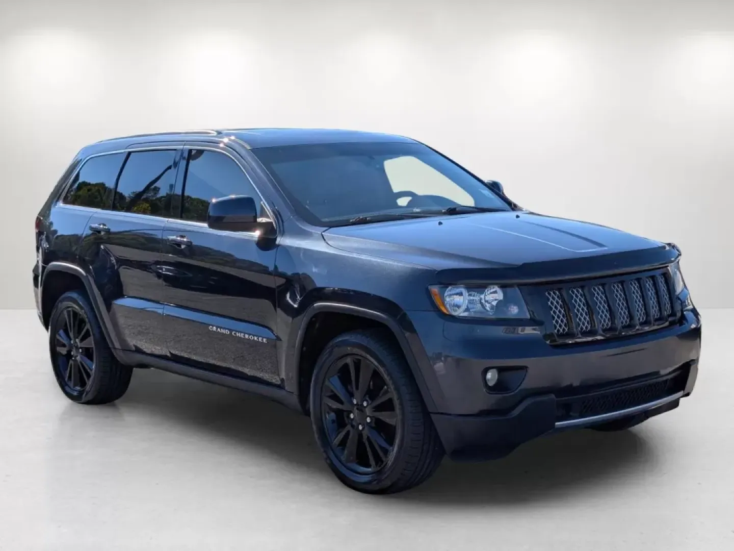 2012 /Dark Graystone/Medium Graystone Jeep Grand Cherokee Laredo Altitude (1C4RJEAG0CC) with an Other engine, located at 1430 Gateway Drive, Opelika, AL, 36801, (334) 239-0944, 32.637871, -85.409790 - **Unleash Your Adventurous Spirit with the 2012 Jeep Grand Cherokee Laredo Altitude!**<br /> <br /> Are you looking for the perfect vehicle to elevate your lifestyle? Whether it's weekend getaways, daily commutes, or family road trips, the 2012 Jeep Grand Cherokee Laredo Altitude is designed to meet - Photo#2