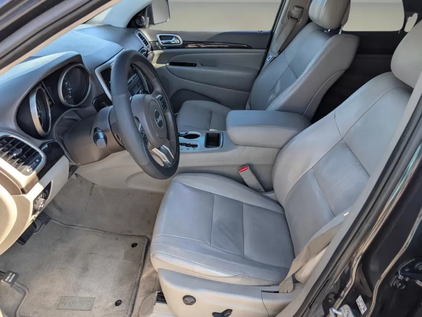 2012 /Dark Graystone/Medium Graystone Jeep Grand Cherokee Laredo Altitude (1C4RJEAG0CC) with an Other engine, located at 1430 Gateway Drive, Opelika, AL, 36801, (334) 239-0944, 32.637871, -85.409790 - **Unleash Your Adventurous Spirit with the 2012 Jeep Grand Cherokee Laredo Altitude!**<br /> <br /> Are you looking for the perfect vehicle to elevate your lifestyle? Whether it's weekend getaways, daily commutes, or family road trips, the 2012 Jeep Grand Cherokee Laredo Altitude is designed to meet - Photo#11