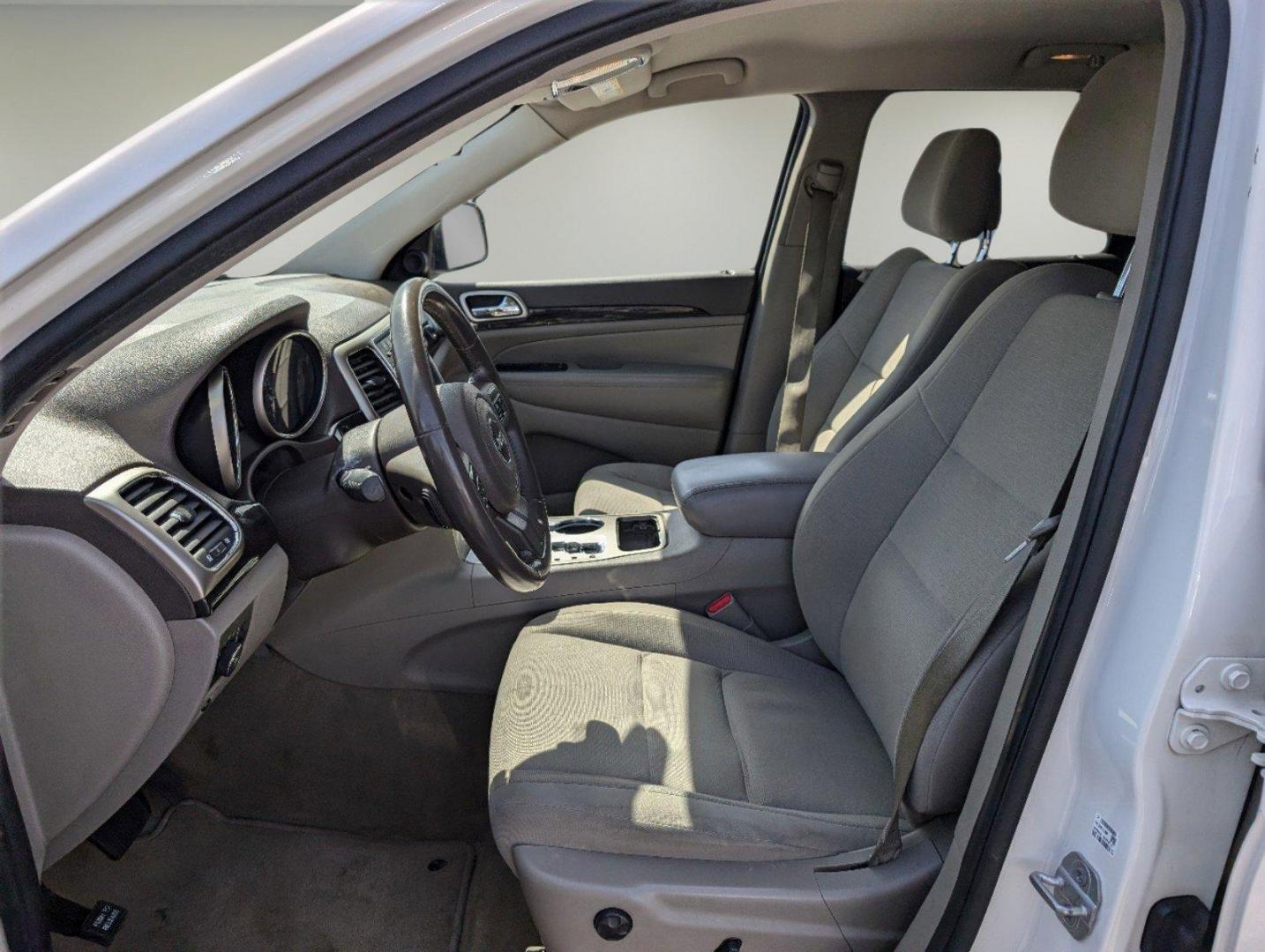 2012 Stone White /Dark Graystone/Medium Graystone Jeep Grand Cherokee Laredo (1C4RJFAG1CC) with an Gas/Ethanol V6 3.6L/220 engine, 5-Speed Automatic transmission, located at 804 22nd Ave, Phenix City, AL, 36870, (334) 297-1860, 32.484749, -85.024475 - 2012 Jeep Grand Cherokee Laredo - Photo#9