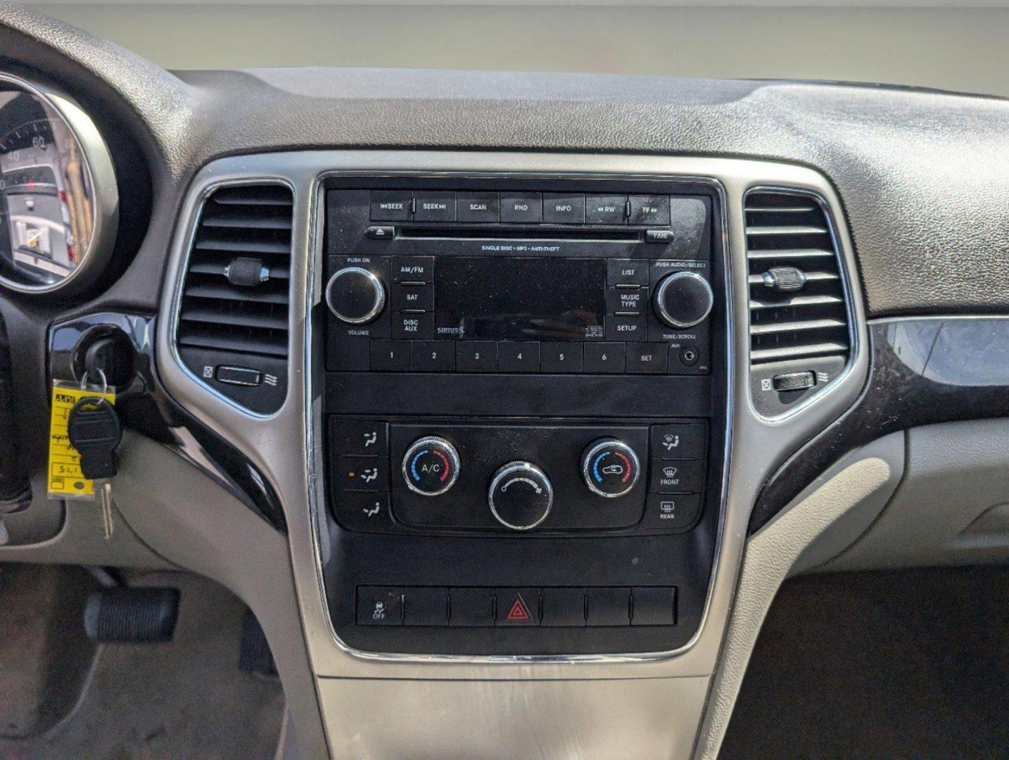 2012 Stone White /Dark Graystone/Medium Graystone Jeep Grand Cherokee Laredo (1C4RJFAG1CC) with an Gas/Ethanol V6 3.6L/220 engine, 5-Speed Automatic transmission, located at 804 22nd Ave, Phenix City, AL, 36870, (334) 297-1860, 32.484749, -85.024475 - 2012 Jeep Grand Cherokee Laredo - Photo#13