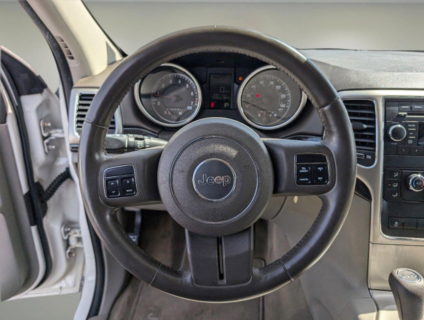 2012 Stone White /Dark Graystone/Medium Graystone Jeep Grand Cherokee Laredo (1C4RJFAG1CC) with an Gas/Ethanol V6 3.6L/220 engine, 5-Speed Automatic transmission, located at 804 22nd Ave, Phenix City, AL, 36870, (334) 297-1860, 32.484749, -85.024475 - 2012 Jeep Grand Cherokee Laredo - Photo#15