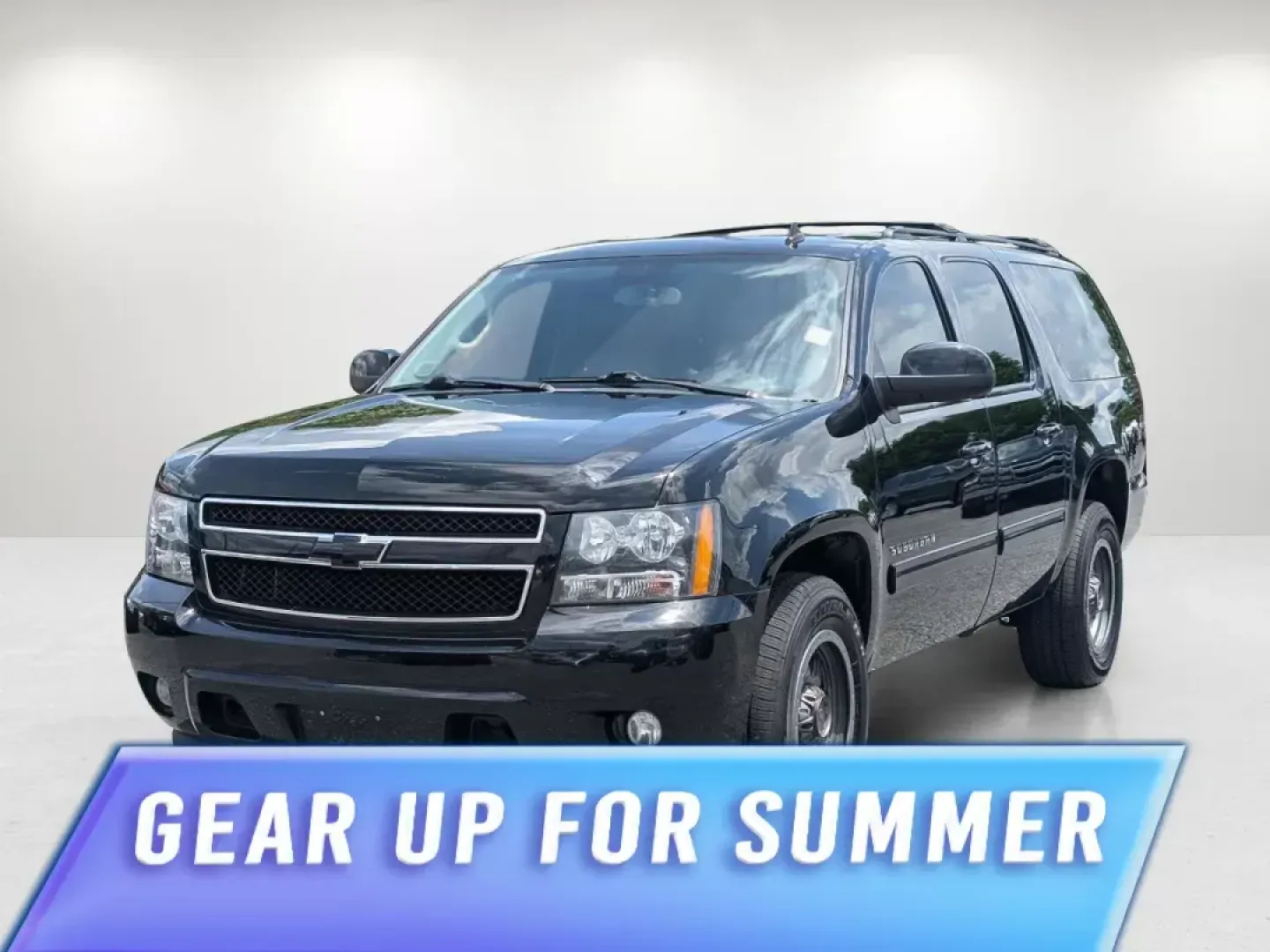 2013 /Ebony Chevrolet Suburban LT (1GNSCJE02DR) with an Gas/Ethanol V8 5.3L/323 engine, 6-Speed Automatic transmission, located at 3959 U.S. 80 W, Phenix City, AL, 36870, (334) 297-4885, 32.469296, -85.135185 - 2013 Chevrolet Suburban LT - Photo#0