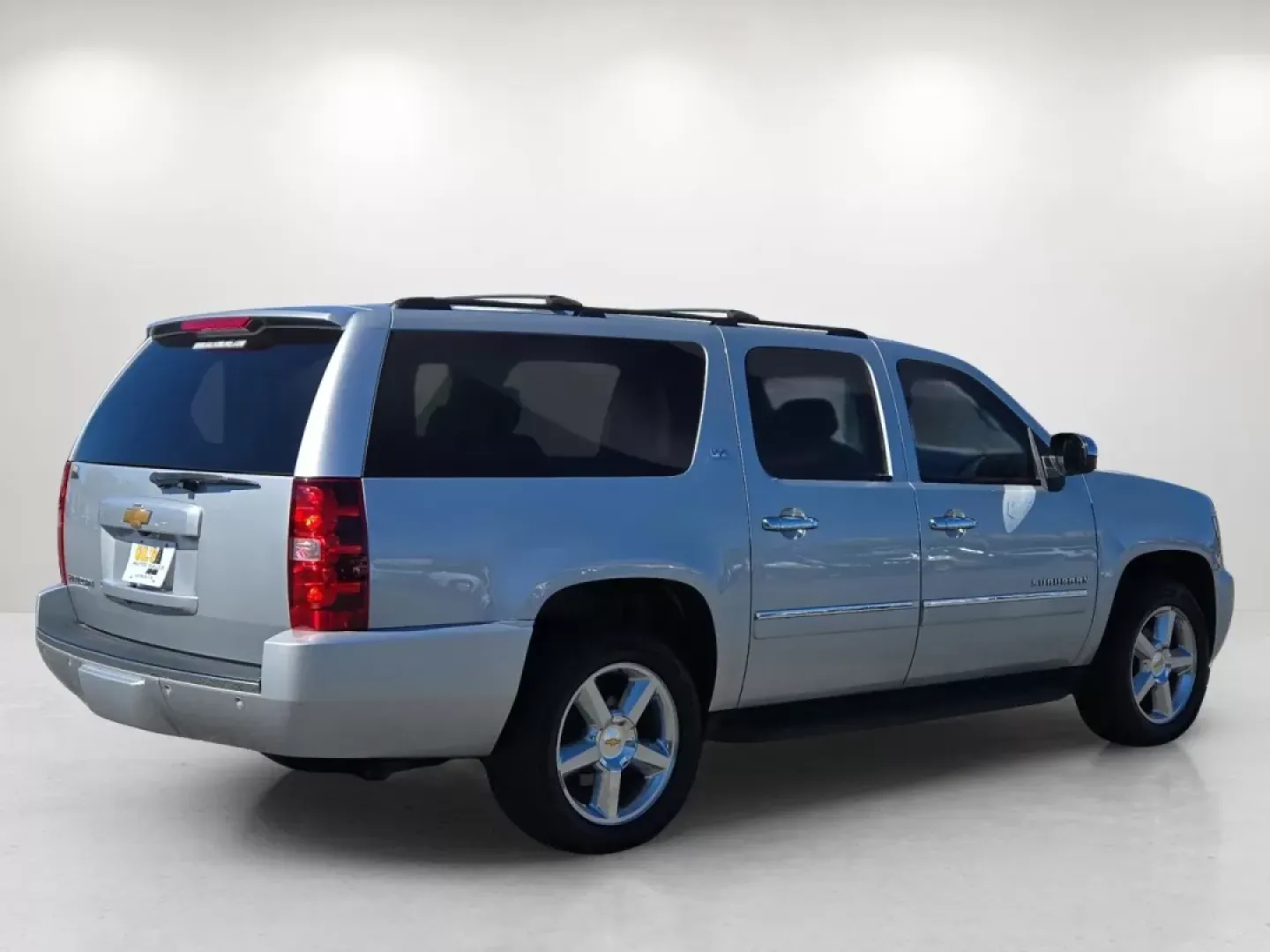2013 /Light Titanium/Dark Titanium Chevrolet Suburban LTZ (1GNSCKE02DR) with an Other engine, located at 804 22nd Ave, Phenix City, AL, 36870, (334) 297-1860, 32.484749, -85.024475 - Step into a world of adventure and family bonding with this 2013 Chevrolet Suburban LTZ, available now at Gils Auto in Phenix City, AL. Ideal for growing families or anyone who loves the open road, this spacious SUV combines luxury, comfort, and versatility for those seeking a reliable vehicle for e - Photo#5