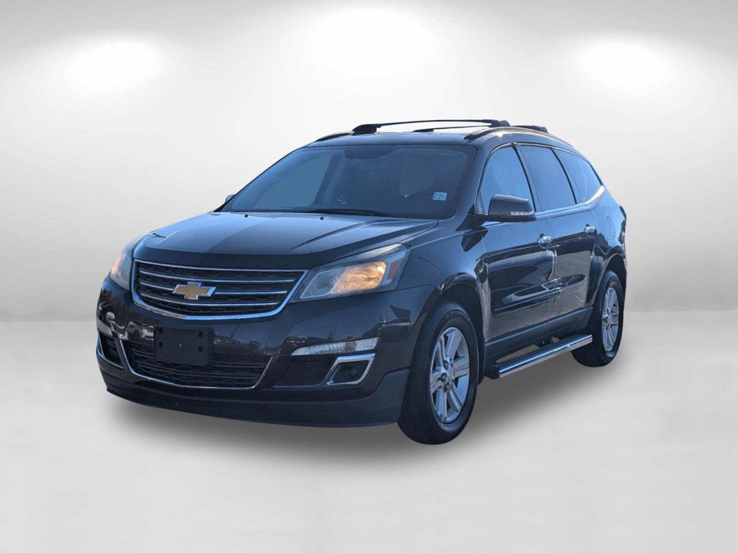 2013 /Ebony Chevrolet Traverse LT (1GNKRGKD6DJ) with an Gas V6 3.6L/217 engine, 6-Speed Automatic transmission, located at 5115 14th Ave., Columbus, GA, 31904, (706) 323-0345, 32.511494, -84.971046 - 2013 Chevrolet Traverse LT - Photo#1