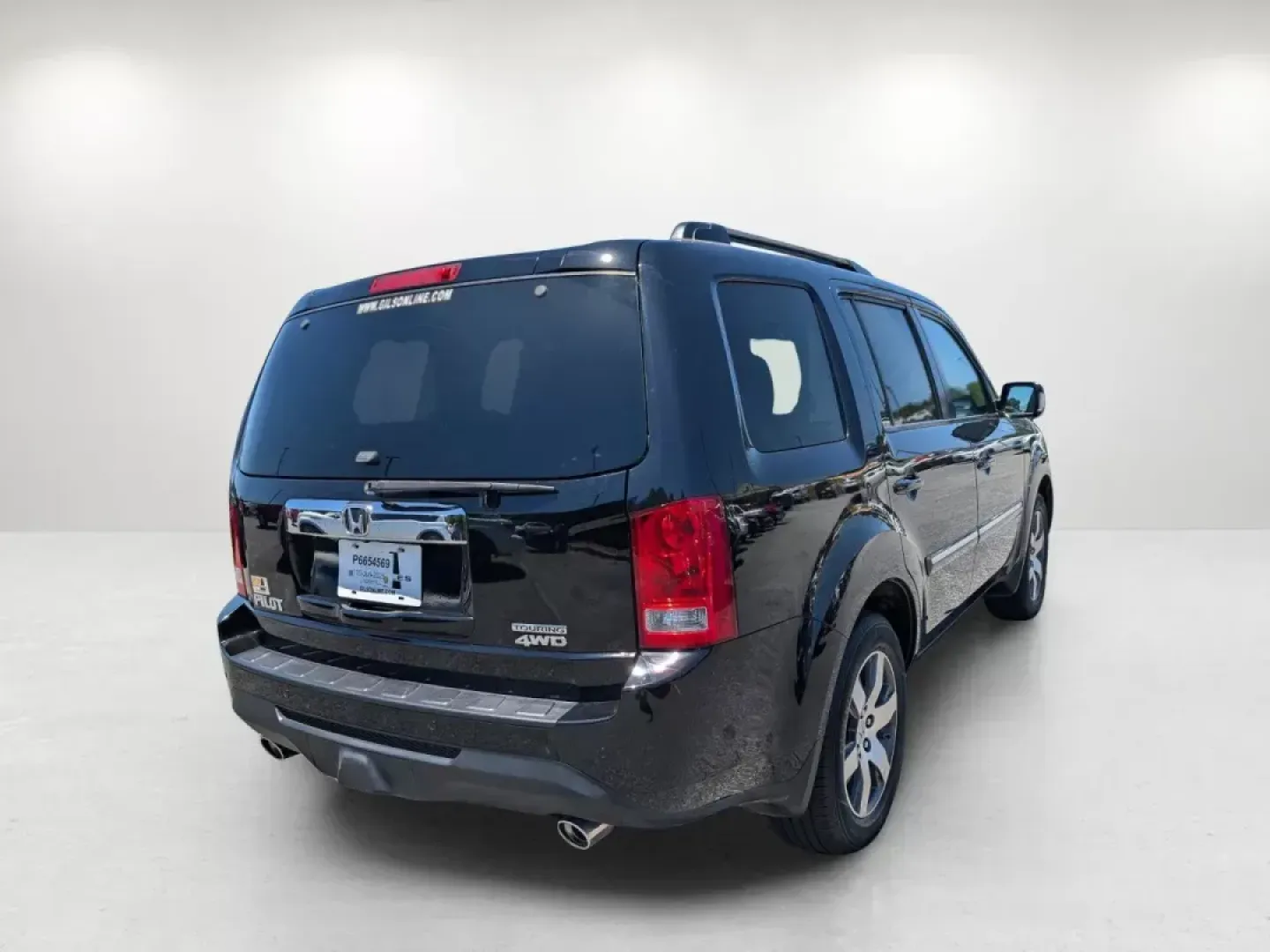 2013 Honda Pilot Touring (5FNYF4H99DB) with an Gas V6 3.5L/212 engine, 5-Speed Automatic transmission, located at 3959 U.S. 80 W, Phenix City, AL, 36870, (334) 297-4885, 32.469296, -85.135185 - 2013 Honda Pilot Touring - Photo#4