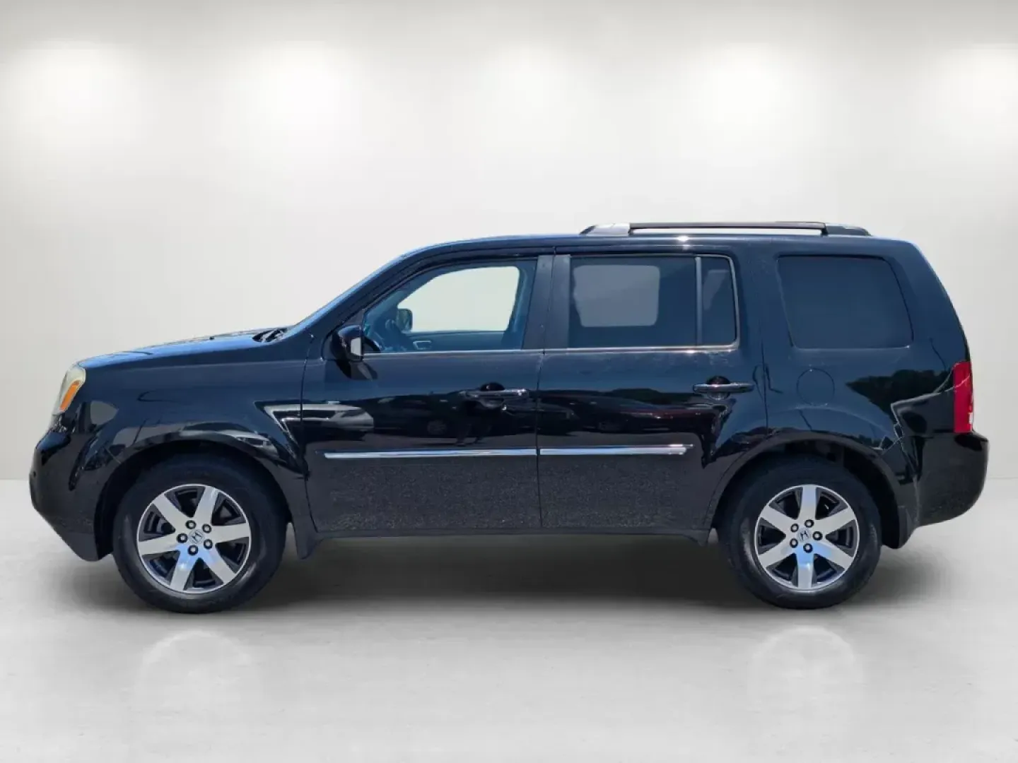 2013 Honda Pilot Touring (5FNYF4H99DB) with an Gas V6 3.5L/212 engine, 5-Speed Automatic transmission, located at 3959 U.S. 80 W, Phenix City, AL, 36870, (334) 297-4885, 32.469296, -85.135185 - 2013 Honda Pilot Touring - Photo#7