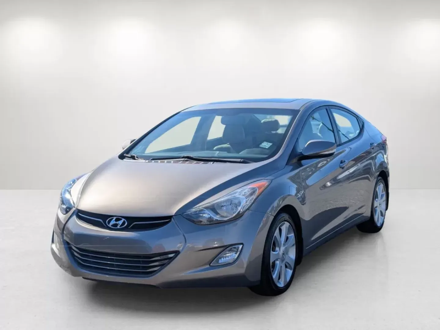 2013 /Beige Hyundai Elantra Limited (5NPDH4AE1DH) with an Other engine, located at 3959 U.S. 80 W, Phenix City, AL, 36870, (334) 297-4885, 32.469296, -85.135185 - **Discover Your Next Adventure with the 2013 Hyundai Elantra Limited! Perfect for Commuters and Families Alike!**<br /> <br /> Are you searching for a reliable sedan that excels in both comfort and practicality? Look no further than the stunning 2013 Hyundai Elantra Limited, available now at Gils Au - Photo#1