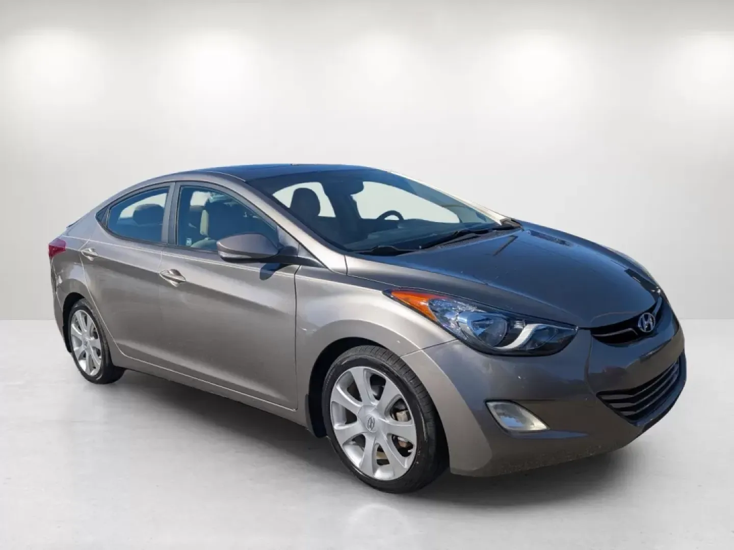 2013 /Beige Hyundai Elantra Limited (5NPDH4AE1DH) with an Other engine, located at 3959 U.S. 80 W, Phenix City, AL, 36870, (334) 297-4885, 32.469296, -85.135185 - **Discover Your Next Adventure with the 2013 Hyundai Elantra Limited! Perfect for Commuters and Families Alike!**<br /> <br /> Are you searching for a reliable sedan that excels in both comfort and practicality? Look no further than the stunning 2013 Hyundai Elantra Limited, available now at Gils Au - Photo#3