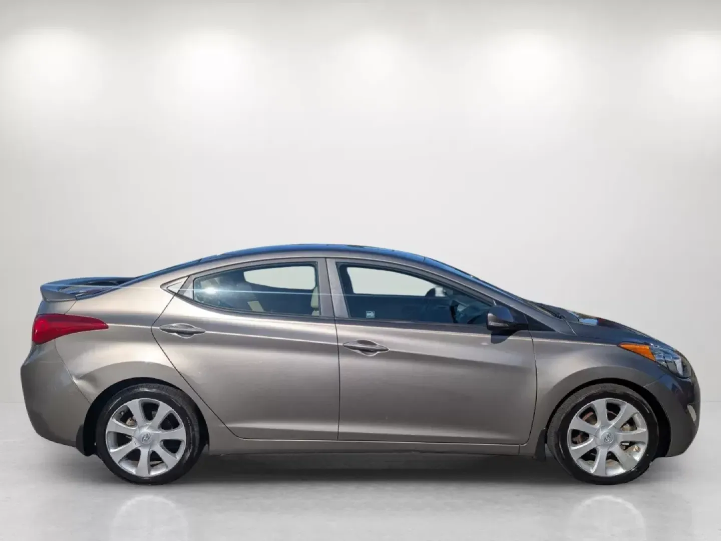 2013 /Beige Hyundai Elantra Limited (5NPDH4AE1DH) with an Other engine, located at 3959 U.S. 80 W, Phenix City, AL, 36870, (334) 297-4885, 32.469296, -85.135185 - **Discover Your Next Adventure with the 2013 Hyundai Elantra Limited! Perfect for Commuters and Families Alike!**<br /> <br /> Are you searching for a reliable sedan that excels in both comfort and practicality? Look no further than the stunning 2013 Hyundai Elantra Limited, available now at Gils Au - Photo#4