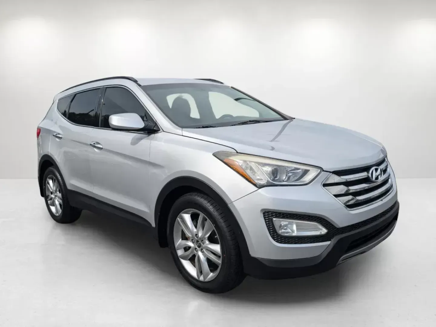 2013 /Black Hyundai Santa Fe 2.0T Sport (5XYZUDLA0DG) with an Turbocharged Gas I4 2.0L/122 engine, 6-Speed Automatic w/Manual Shift transmission, located at 521 Old Farm Lane Rd, Prattville, AL, 36066, (334) 325-1505, 32.482460, -86.416367 - Are you searching for the perfect vehicle to elevate your family's adventures or enhance your daily commute? Look no further than this stunning 2013 Hyundai Santa Fe 2.0T Sport, available now at Gils Auto in Prattville, AL! This versatile SUV is ideal for growing families, weekend getaways, or anyon - Photo#2
