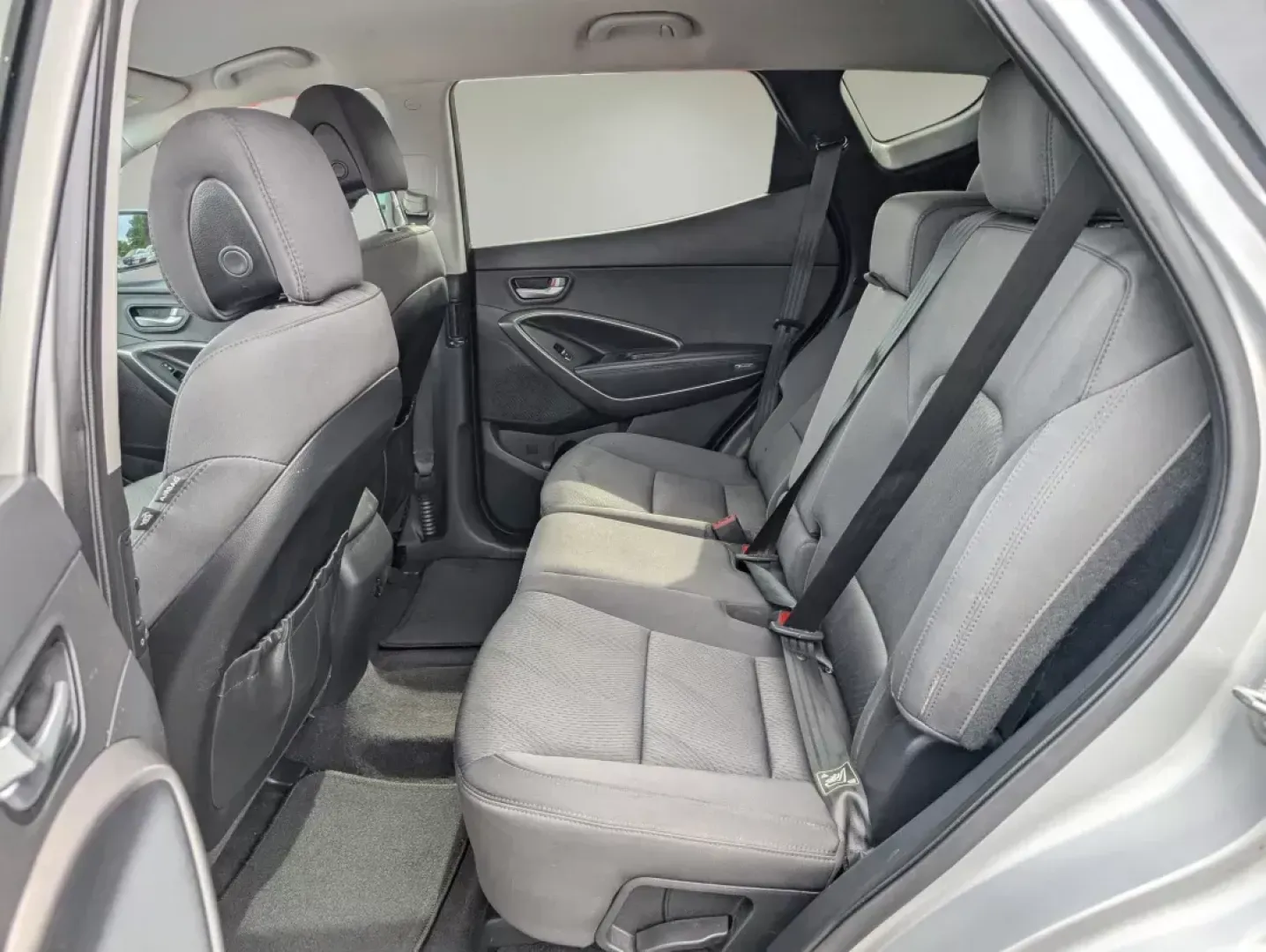 2013 /Black Hyundai Santa Fe 2.0T Sport (5XYZUDLA0DG) with an Turbocharged Gas I4 2.0L/122 engine, 6-Speed Automatic w/Manual Shift transmission, located at 521 Old Farm Lane Rd, Prattville, AL, 36066, (334) 325-1505, 32.482460, -86.416367 - Are you searching for the perfect vehicle to elevate your family's adventures or enhance your daily commute? Look no further than this stunning 2013 Hyundai Santa Fe 2.0T Sport, available now at Gils Auto in Prattville, AL! This versatile SUV is ideal for growing families, weekend getaways, or anyon - Photo#10