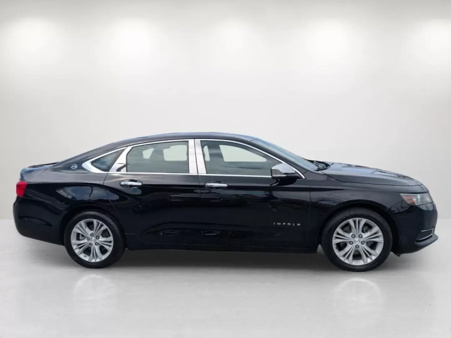 2014 /Jet Black Chevrolet Impala LT (1G1125S32EU) with an Other engine, located at 804 22nd Ave, Phenix City, AL, 36870, (334) 297-1860, 32.484749, -85.024475 - Experience the perfect blend of comfort, style, and technology with this stunning 2014 Chevrolet Impala LT, now available at Gils Auto in Phenix City, AL. Whether you're commuting to work, taking the family on weekend adventures, or simply running errands around town, this sedan brings a level of so - Photo#3