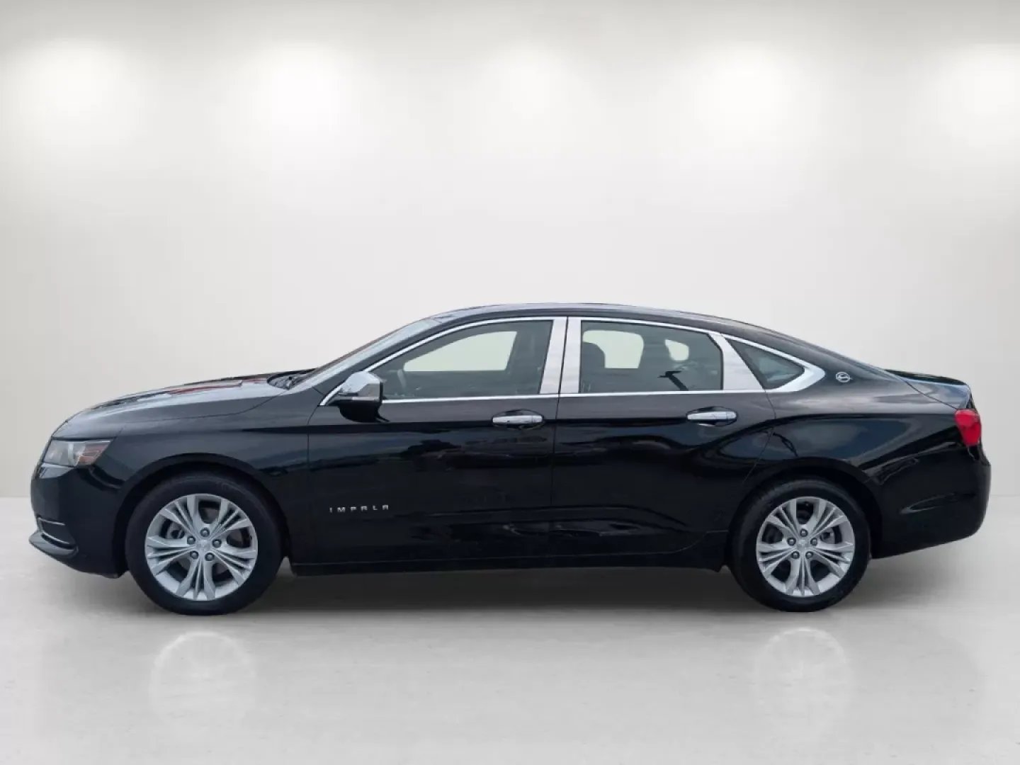 2014 /Jet Black Chevrolet Impala LT (1G1125S32EU) with an Other engine, located at 804 22nd Ave, Phenix City, AL, 36870, (334) 297-1860, 32.484749, -85.024475 - Experience the perfect blend of comfort, style, and technology with this stunning 2014 Chevrolet Impala LT, now available at Gils Auto in Phenix City, AL. Whether you're commuting to work, taking the family on weekend adventures, or simply running errands around town, this sedan brings a level of so - Photo#7