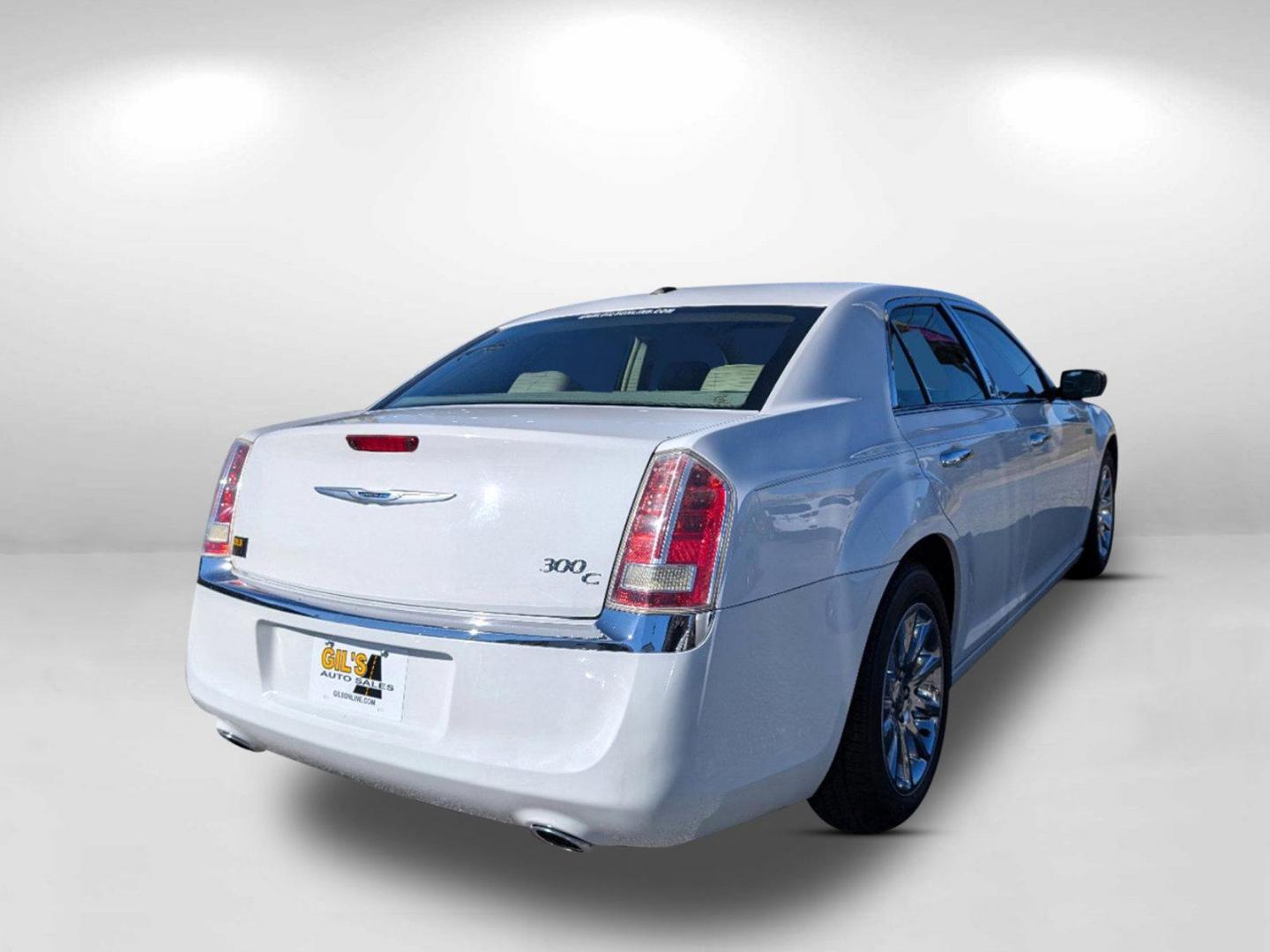 2014 /Lt Frost/Dk Frost Beige Chrysler 300 300C (2C3CCAEG5EH) with an Regular Unleaded V-6 3.6 L/220 engine, 8-Speed Automatic w/OD transmission, located at 3959 U.S. 80 W, Phenix City, AL, 36870, (334) 297-4885, 32.469296, -85.135185 - 2014 Chrysler 300 300C - Photo#5