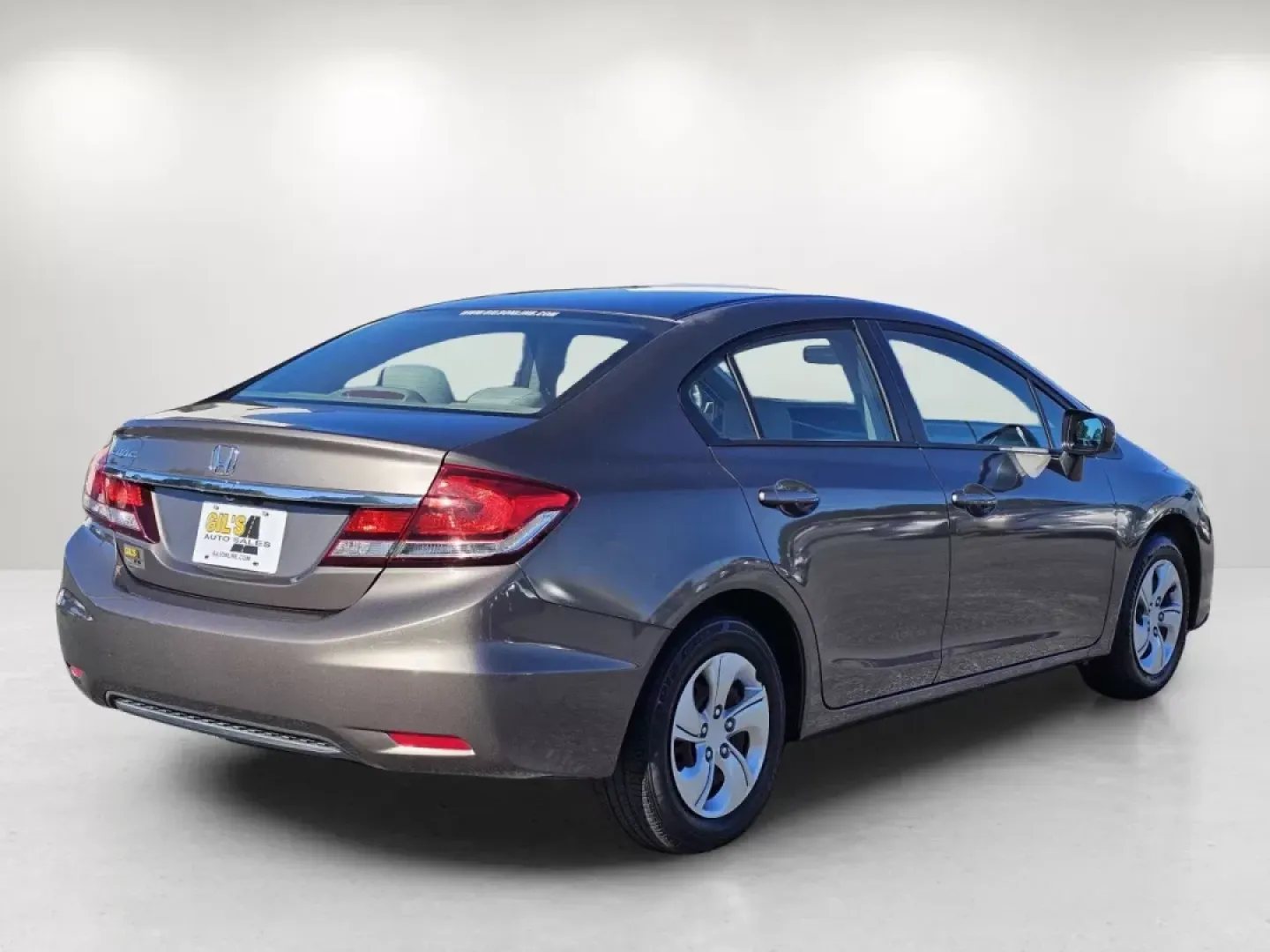 2014 Honda Civic Sedan LX (2HGFB2F52EH) with an Other engine, located at 804 22nd Ave, Phenix City, AL, 36870, (334) 297-1860, 32.484749, -85.024475 - Are you on the lookout for a dependable sedan that combines fuel efficiency with a comfortable ride? Look no further than this 2014 Honda Civic Sedan, available now at Gils Auto in Phenix City, AL. Perfect for budget-conscious buyers, this vehicle is not just economical; it's also a practical choice - Photo#4