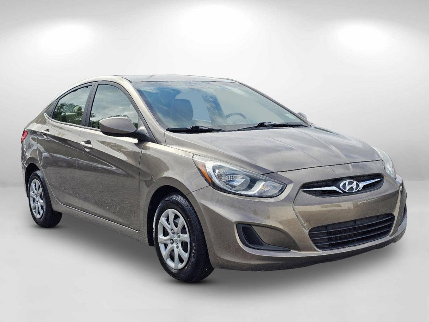 2014 Mocho Bronze Metallic /Beige Hyundai Accent GLS (KMHCT4AE4EU) with an Regular Unleaded I-4 1.6 L/97 engine, 6-Speed Automatic w/OD transmission, located at 5115 14th Ave., Columbus, GA, 31904, (706) 323-0345, 32.511494, -84.971046 - 2014 Hyundai Accent GLS - Photo#2