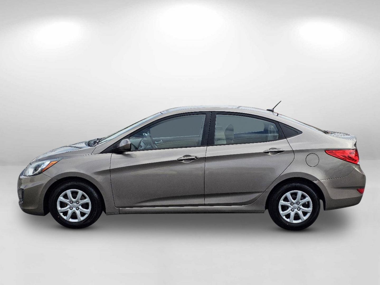 2014 Mocho Bronze Metallic /Beige Hyundai Accent GLS (KMHCT4AE4EU) with an Regular Unleaded I-4 1.6 L/97 engine, 6-Speed Automatic w/OD transmission, located at 5115 14th Ave., Columbus, GA, 31904, (706) 323-0345, 32.511494, -84.971046 - 2014 Hyundai Accent GLS - Photo#7