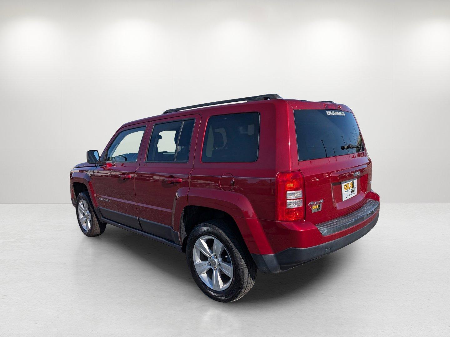2014 /Dark Slate Gray Jeep Patriot Latitude (1C4NJRFB0ED) with an Regular Unleaded I-4 2.4 L/144 engine, 6-Speed Automatic w/OD transmission, located at 1430 Gateway Drive, Opelika, AL, 36801, (334) 239-0944, 32.637871, -85.409790 - 2014 Jeep Patriot Latitude - Photo#6
