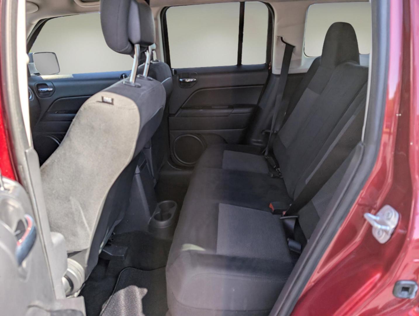2014 /Dark Slate Gray Jeep Patriot Latitude (1C4NJRFB0ED) with an Regular Unleaded I-4 2.4 L/144 engine, 6-Speed Automatic w/OD transmission, located at 1430 Gateway Drive, Opelika, AL, 36801, (334) 239-0944, 32.637871, -85.409790 - 2014 Jeep Patriot Latitude - Photo#10