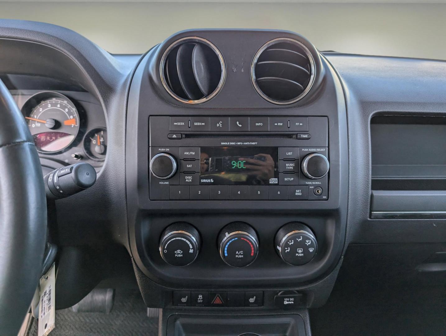2014 /Dark Slate Gray Jeep Patriot Latitude (1C4NJRFB0ED) with an Regular Unleaded I-4 2.4 L/144 engine, 6-Speed Automatic w/OD transmission, located at 1430 Gateway Drive, Opelika, AL, 36801, (334) 239-0944, 32.637871, -85.409790 - 2014 Jeep Patriot Latitude - Photo#14