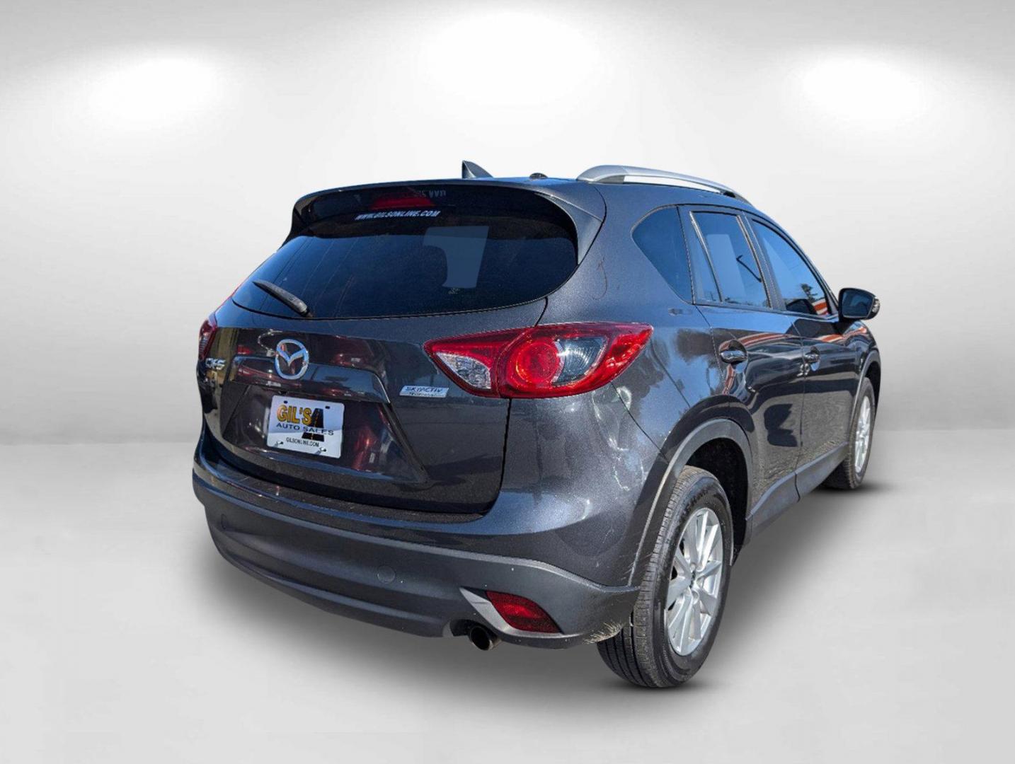 2014 /Black Mazda CX-5 Touring (JM3KE2CY1E0) with an Regular Unleaded I-4 2.5 L/152 engine, 6-Speed Automatic w/OD transmission, located at 804 22nd Ave, Phenix City, AL, 36870, (334) 297-1860, 32.484749, -85.024475 - 2014 Mazda CX-5 Touring - Photo#4