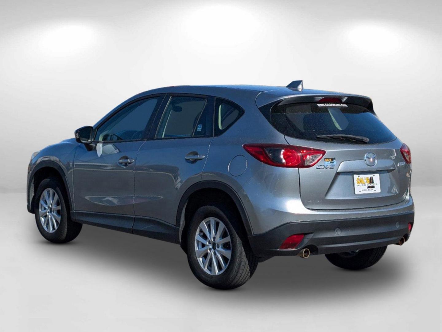 2014 Liquid Silver Metallic /Black Mazda CX-5 Sport (JM3KE2BE7E0) with an Regular Unleaded I-4 2.0 L/122 engine, 6-Speed Automatic w/OD transmission, located at 521 Old Farm Lane Rd, Prattville, AL, 36066, (334) 325-1505, 32.482460, -86.416367 - 2014 Mazda CX-5 Sport - Photo#6