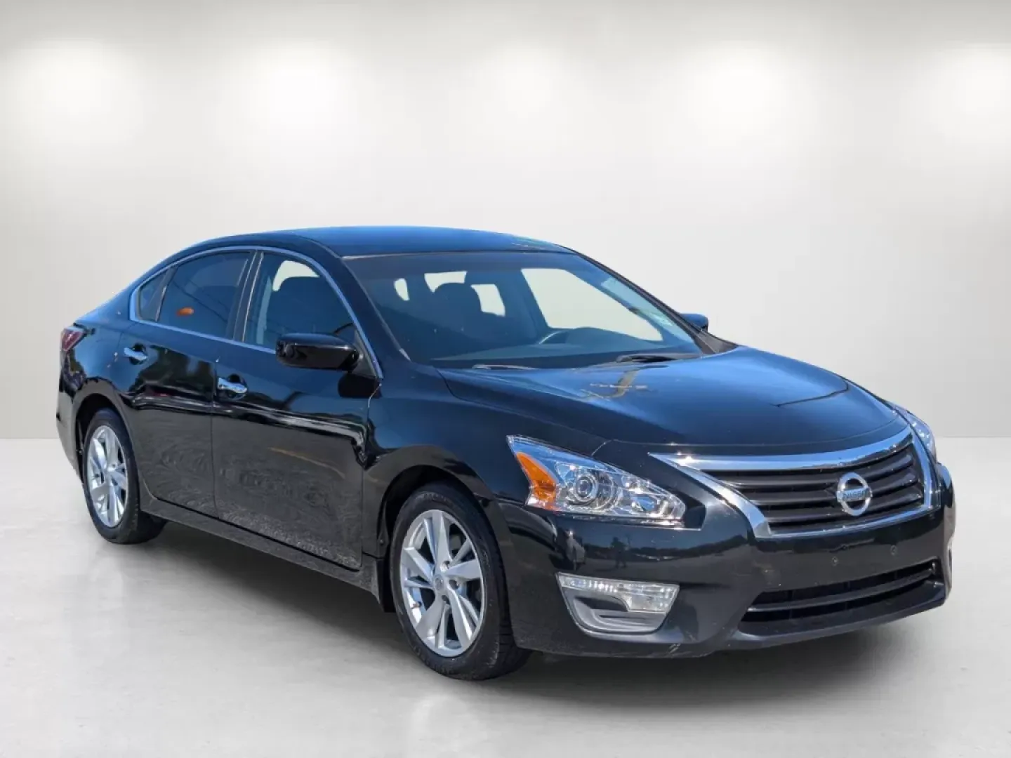 2014 /Black Nissan Altima 2.5 SV (1N4AL3AP8EC) with an Other engine, located at 1430 Gateway Drive, Opelika, AL, 36801, (334) 239-0944, 32.637871, -85.409790 - Discover the perfect blend of comfort, efficiency, and style with this 2014 Nissan Altima 2.5 SV, exclusively available at Gils Auto in Opelika, AL. If you are searching for a reliable sedan that excels in everyday commuting while also offering the versatility for weekend adventures, this Altima is - Photo#2