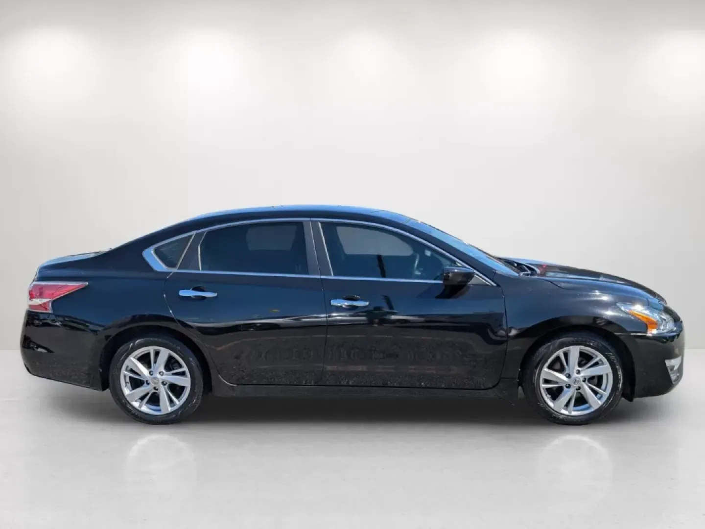 2014 /Black Nissan Altima 2.5 SV (1N4AL3AP8EC) with an Other engine, located at 1430 Gateway Drive, Opelika, AL, 36801, (334) 239-0944, 32.637871, -85.409790 - Discover the perfect blend of comfort, efficiency, and style with this 2014 Nissan Altima 2.5 SV, exclusively available at Gils Auto in Opelika, AL. If you are searching for a reliable sedan that excels in everyday commuting while also offering the versatility for weekend adventures, this Altima is - Photo#3