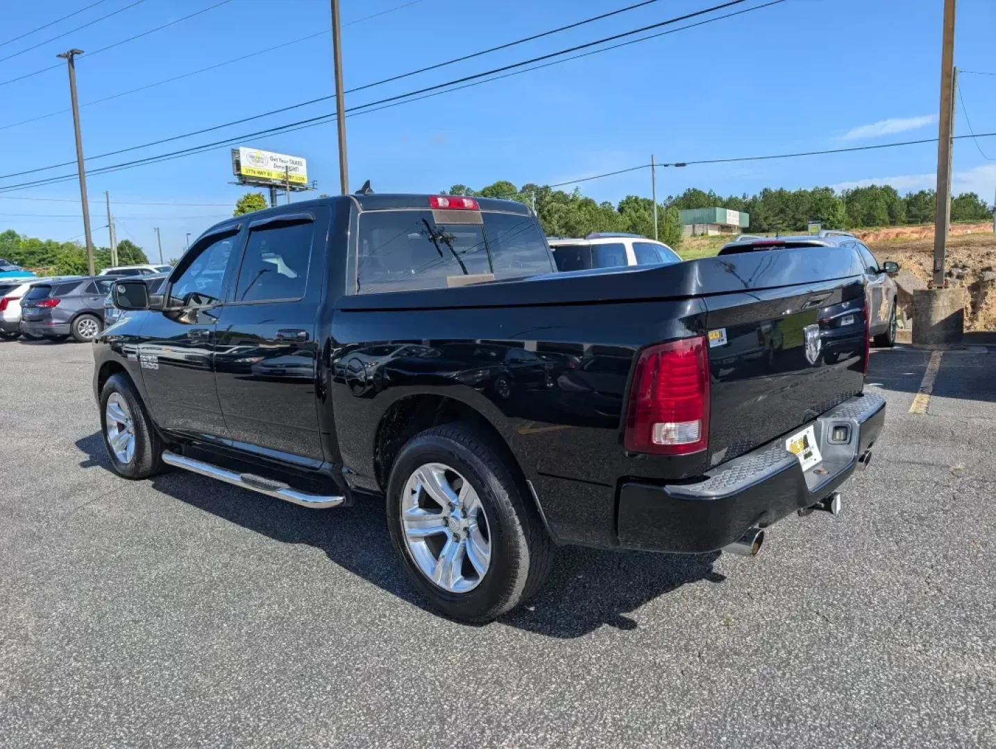 2014 /Black Ram 1500 Sport (1C6RR6MTXES) with an Regular Unleaded V-8 5.7 L/345 engine, 8-Speed Automatic w/OD transmission, located at 3959 U.S. 80 W, Phenix City, AL, 36870, (334) 297-4885, 32.469296, -85.135185 - 2014 Ram 1500 Sport - Photo#6