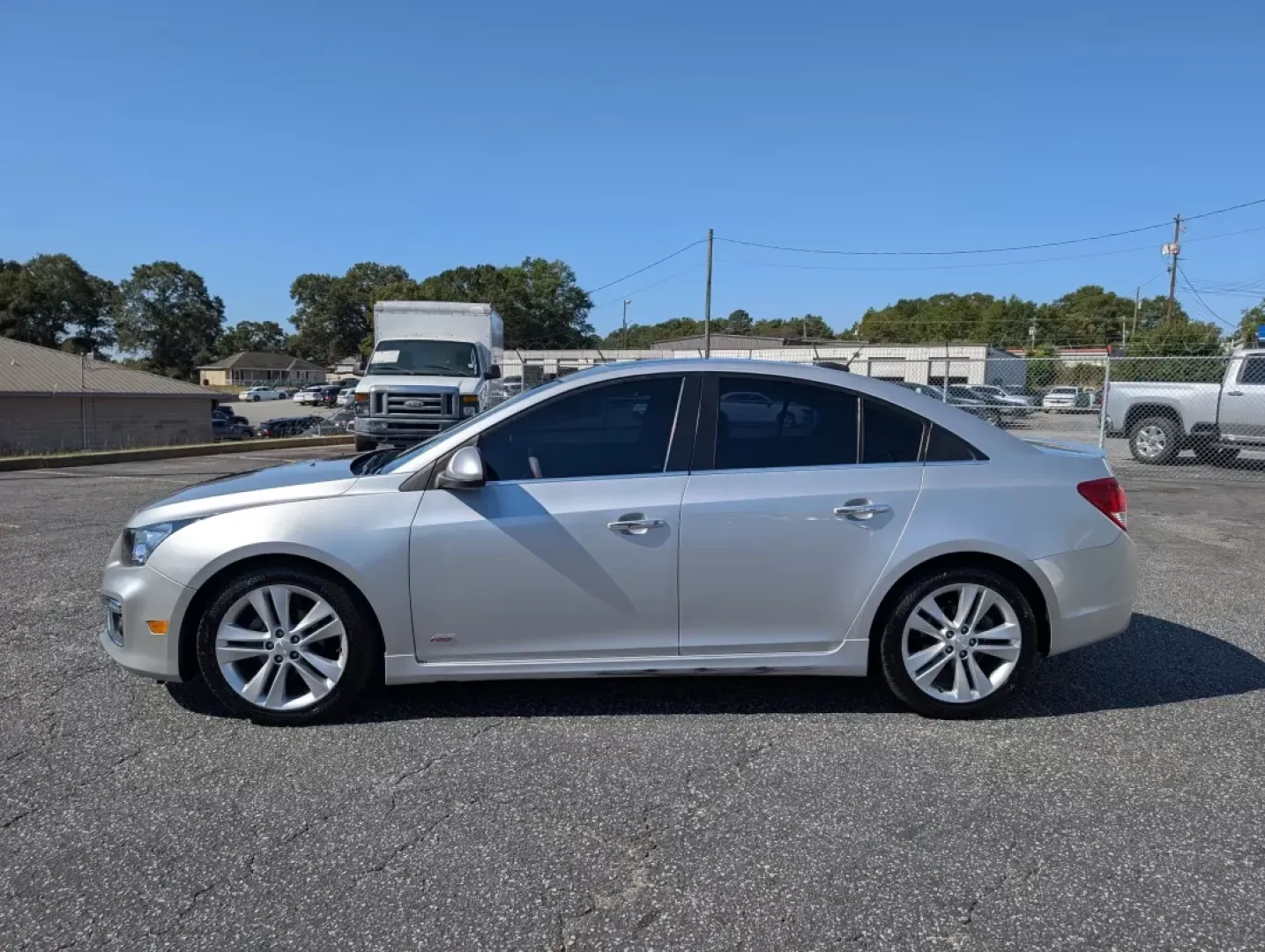 2015 /Jet Black Chevrolet Cruze LTZ (1G1PG5SB8F7) with an Other engine, located at 3959 U.S. 80 W, Phenix City, AL, 36870, (334) 297-4885, 32.469296, -85.135185 - **Discover Unmatched Style and Comfort with the 2015 Chevrolet Cruze LTZ at Gils Auto!**<br /> <br /> Are you in search of a reliable vehicle that fits seamlessly into your daily life? The 2015 Chevrolet Cruze LTZ is the perfect sedan for anyone seeking a stylish ride that excels in efficiency and c - Photo#5