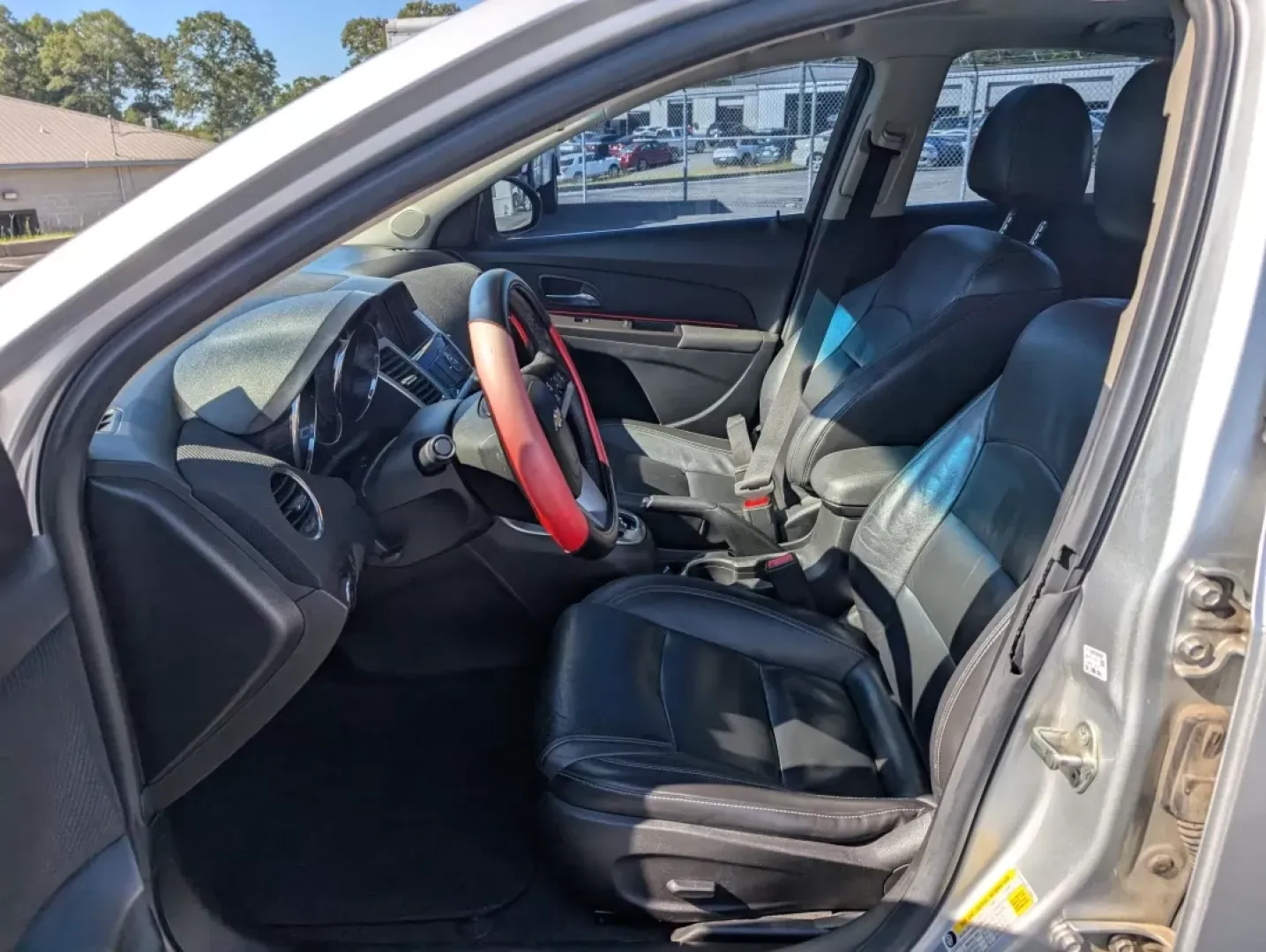 2015 /Jet Black Chevrolet Cruze LTZ (1G1PG5SB8F7) with an Other engine, located at 3959 U.S. 80 W, Phenix City, AL, 36870, (334) 297-4885, 32.469296, -85.135185 - **Discover Unmatched Style and Comfort with the 2015 Chevrolet Cruze LTZ at Gils Auto!**<br /> <br /> Are you in search of a reliable vehicle that fits seamlessly into your daily life? The 2015 Chevrolet Cruze LTZ is the perfect sedan for anyone seeking a stylish ride that excels in efficiency and c - Photo#7