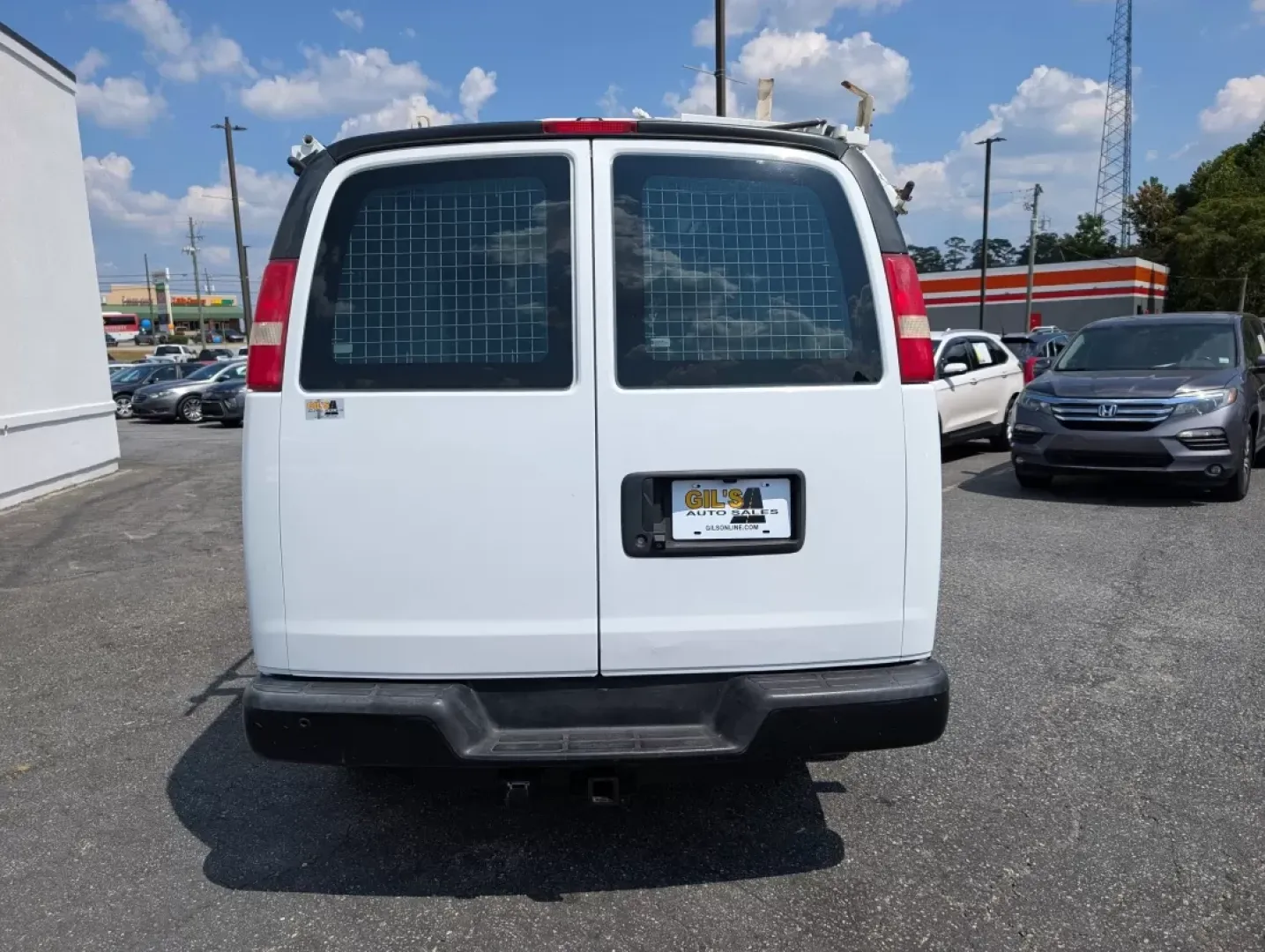 2015 /Medium Pewter Chevrolet Express Cargo Van (1GCWGFCF1F1) with an Other engine, located at 804 22nd Ave, Phenix City, AL, 36870, (334) 297-1860, 32.484749, -85.024475 - Are you in the market for a reliable vehicle that can tackle tough jobs while providing you with the comfort and tech features you need? Look no further than this 2015 Chevrolet Express Cargo Van, available at Gils Auto in Phenix City, AL. This full-size cargo van is not just a vehicle; it's a versa - Photo#6