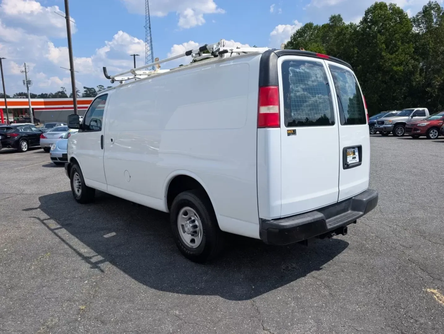 2015 /Medium Pewter Chevrolet Express Cargo Van (1GCWGFCF1F1) with an Other engine, located at 804 22nd Ave, Phenix City, AL, 36870, (334) 297-1860, 32.484749, -85.024475 - Are you in the market for a reliable vehicle that can tackle tough jobs while providing you with the comfort and tech features you need? Look no further than this 2015 Chevrolet Express Cargo Van, available at Gils Auto in Phenix City, AL. This full-size cargo van is not just a vehicle; it's a versa - Photo#7