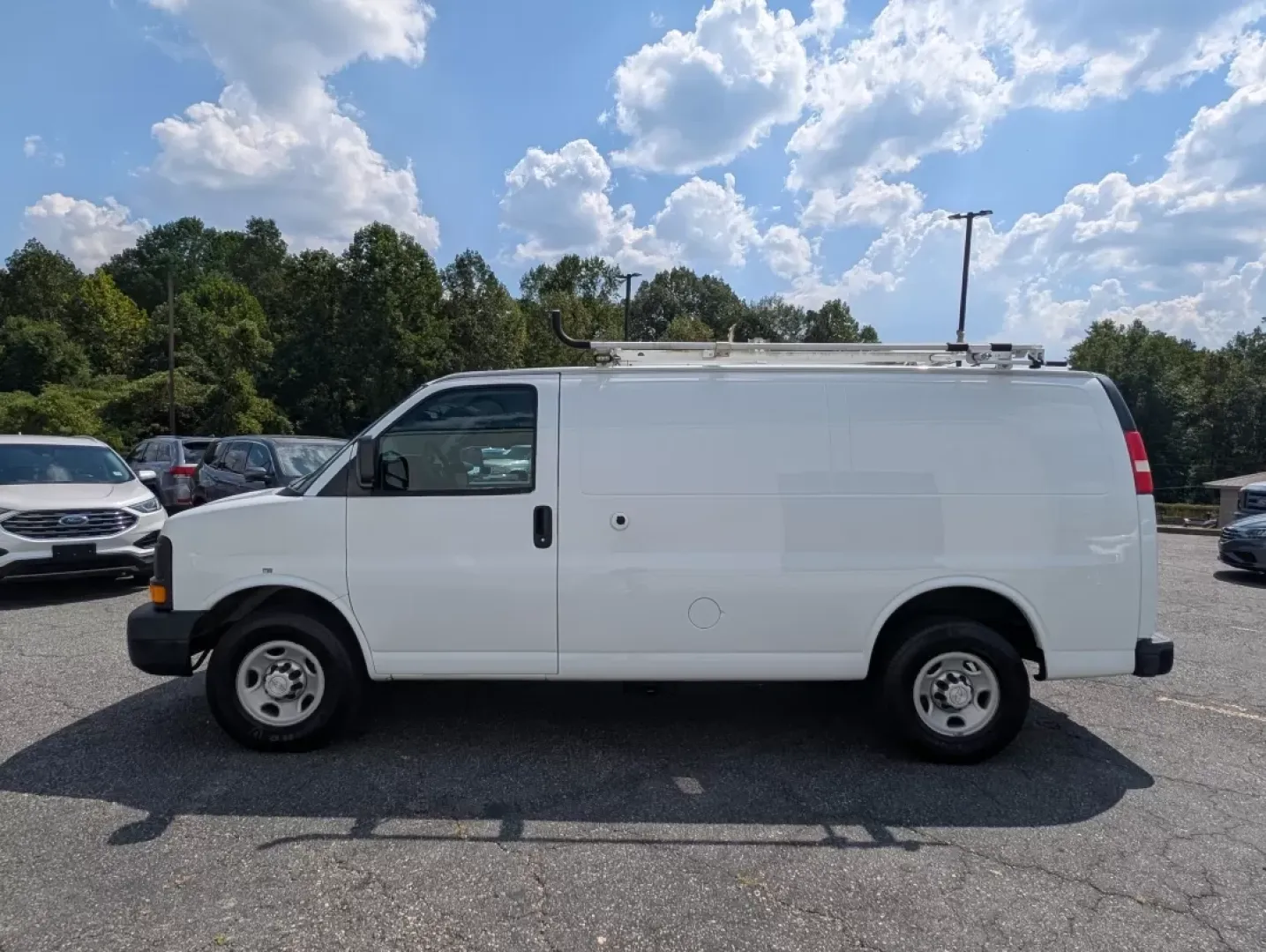 2015 /Medium Pewter Chevrolet Express Cargo Van (1GCWGFCF1F1) with an Other engine, located at 804 22nd Ave, Phenix City, AL, 36870, (334) 297-1860, 32.484749, -85.024475 - Are you in the market for a reliable vehicle that can tackle tough jobs while providing you with the comfort and tech features you need? Look no further than this 2015 Chevrolet Express Cargo Van, available at Gils Auto in Phenix City, AL. This full-size cargo van is not just a vehicle; it's a versa - Photo#8